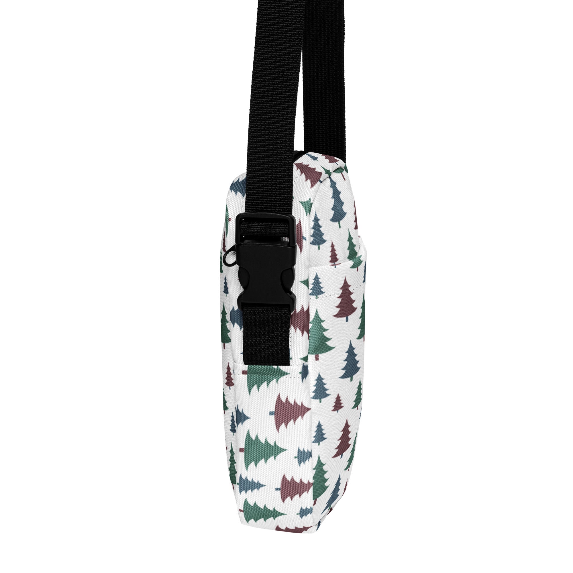 White canvas girls crossbody purse with green and maroon pastel christmas tree pattern and black adjustable strap
