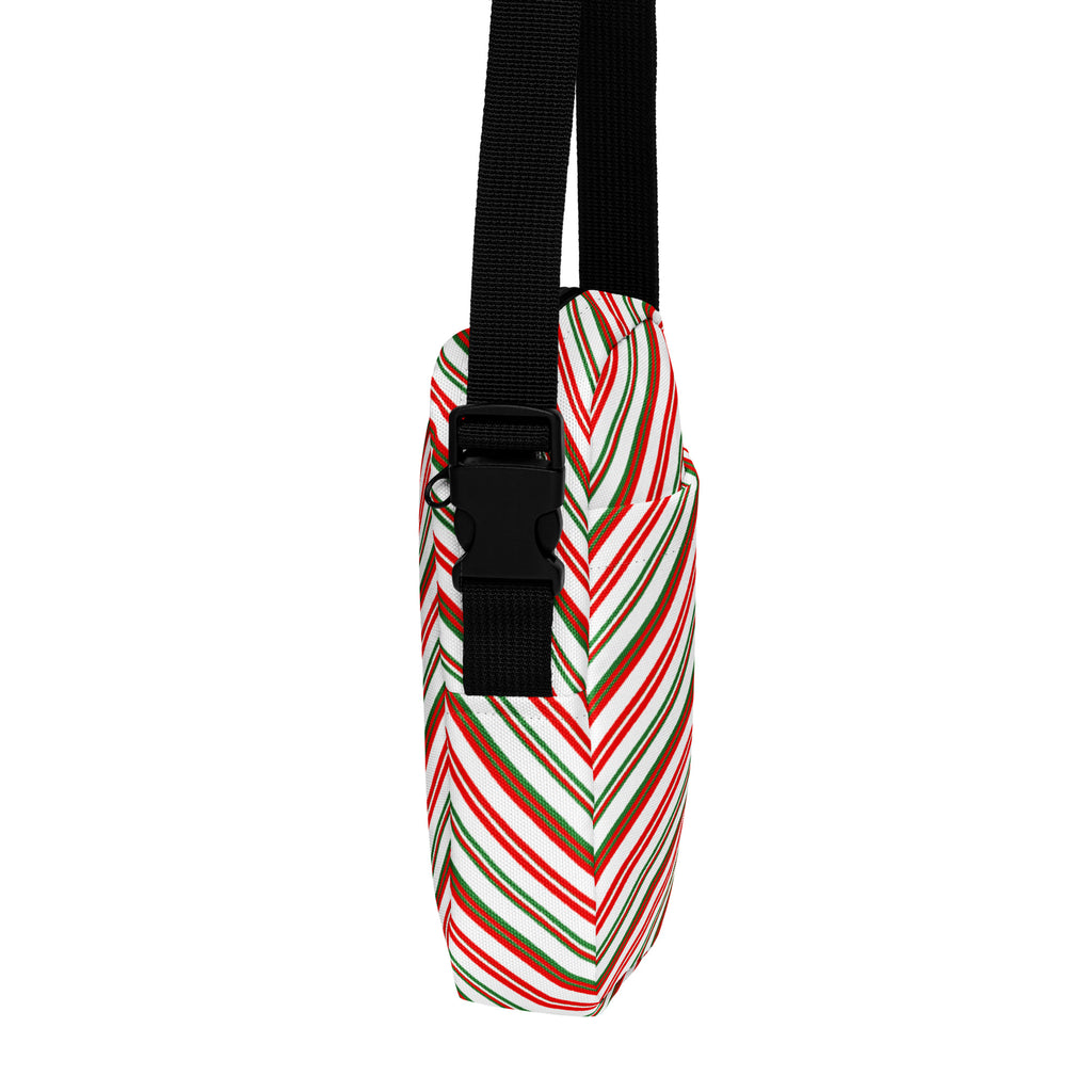 Girls christmas stripes crossbody purse with festive candy cane stripes and black adjustable shoulder strap and buckle