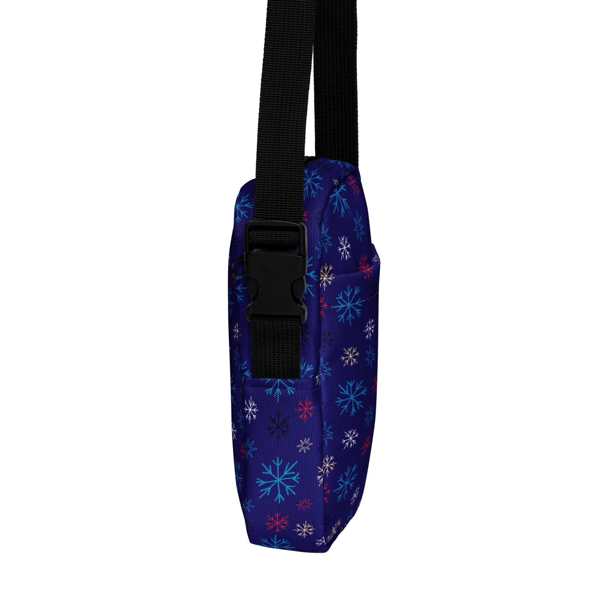 Girls navy crossbody purse made of fabric with multicolor snowflake pattern in light blue white and pink