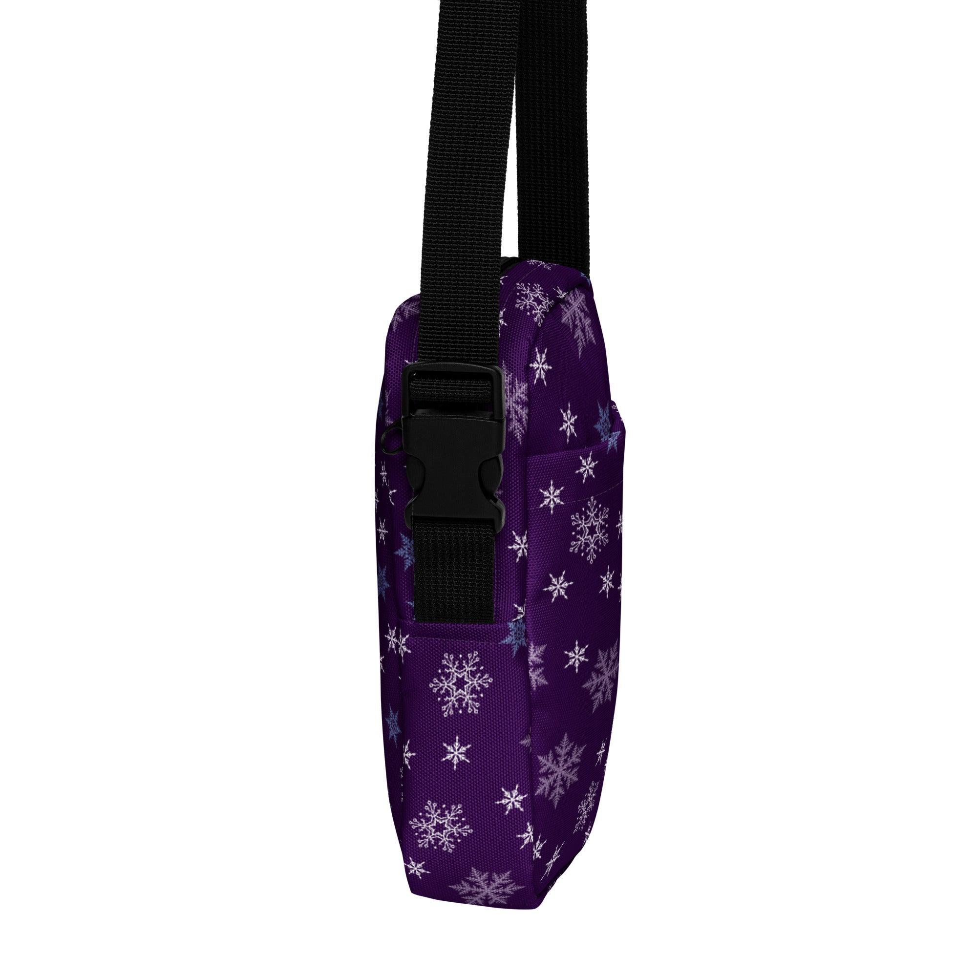 Christmas purple snowflake winter women’s crossbody purse with black adjustable strap and buckle in fabric material