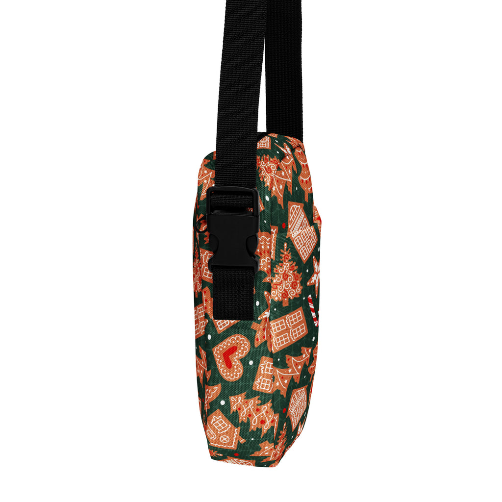 Girls green gingerbread crossbody purse with festive orange and green design and black adjustable strap