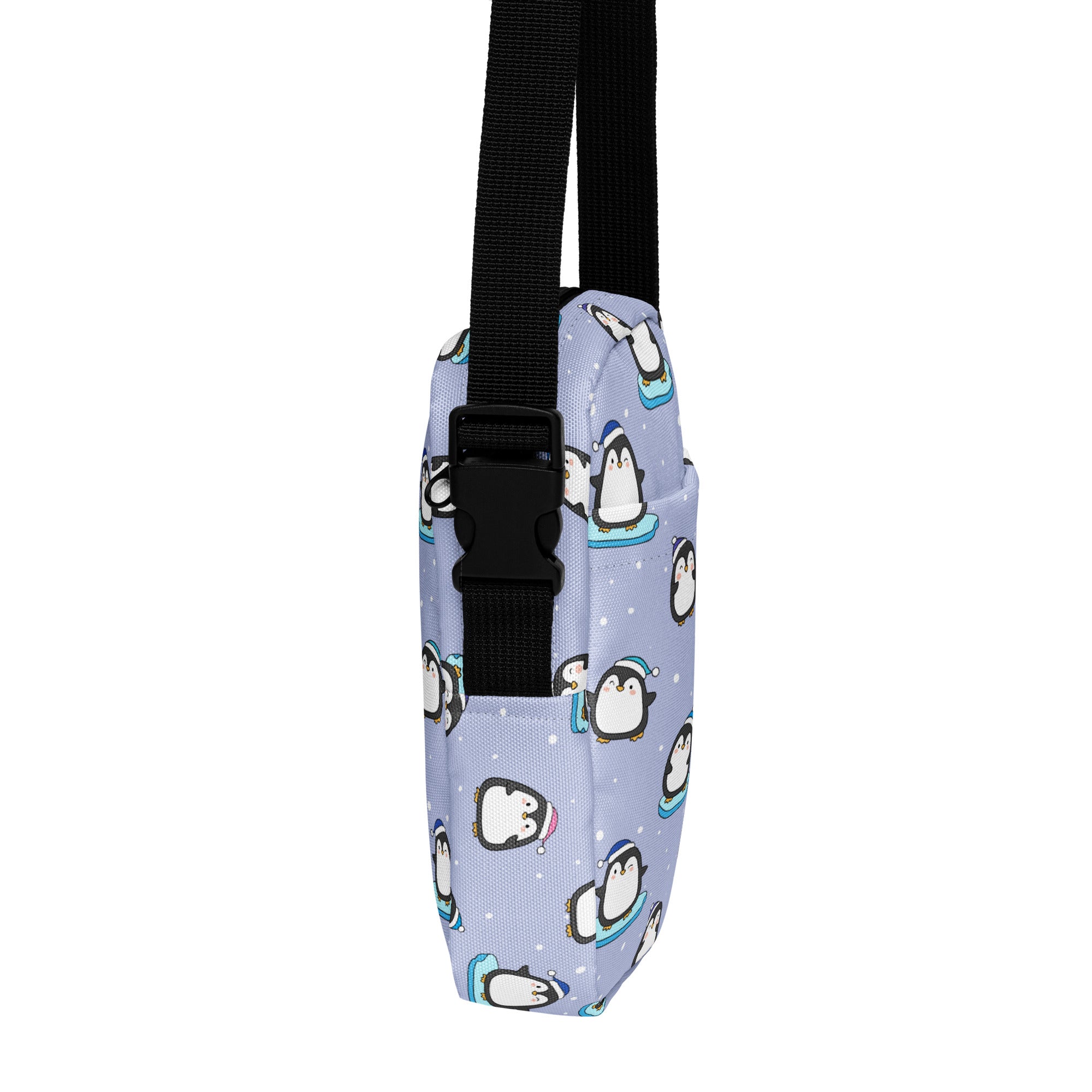 Light purple penguin-themed women’s crossbody purse with black strap and buckle for cute winter style