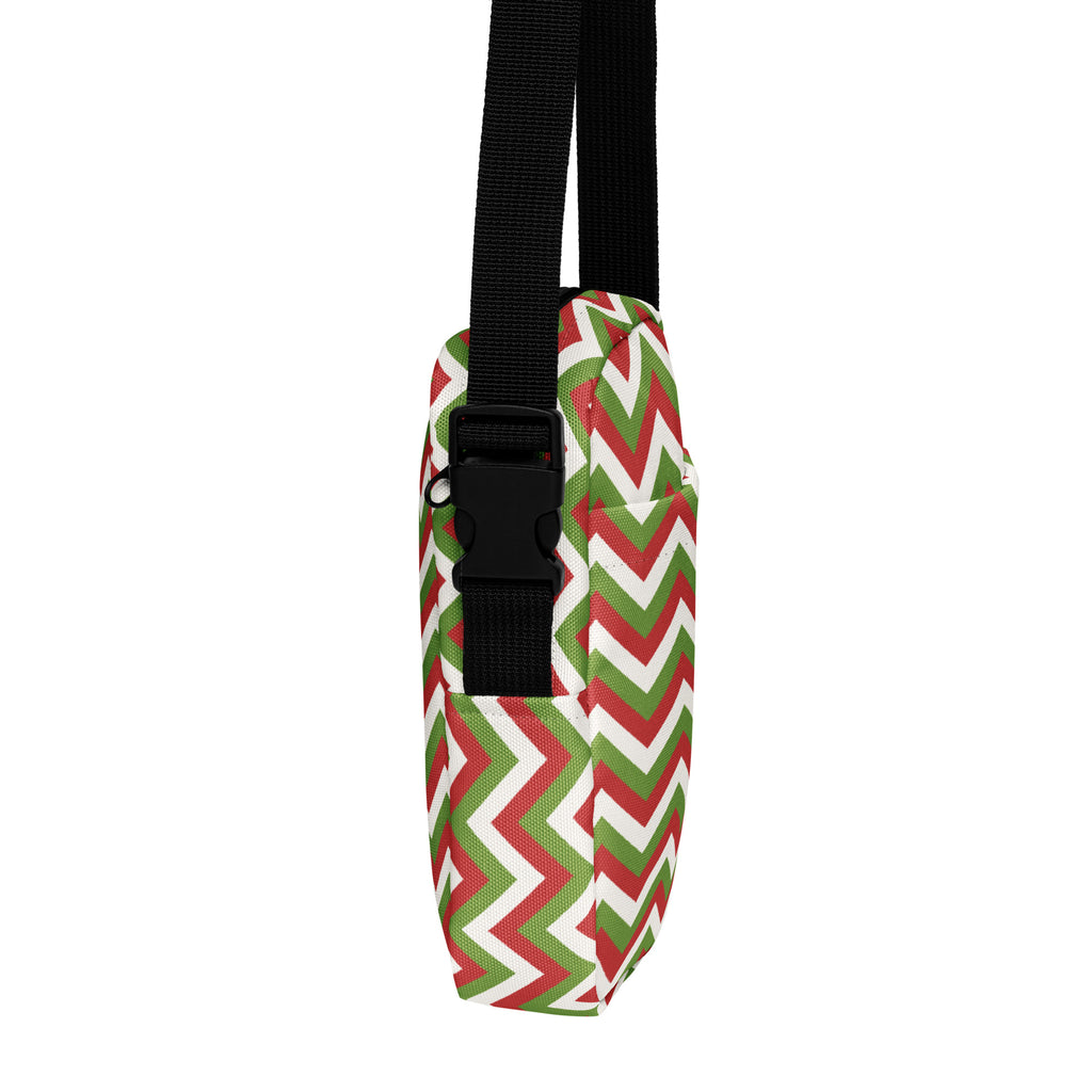 Christmas chevron women’s crossbody purse with festive red green white zigzag fabric and black adjustable strap