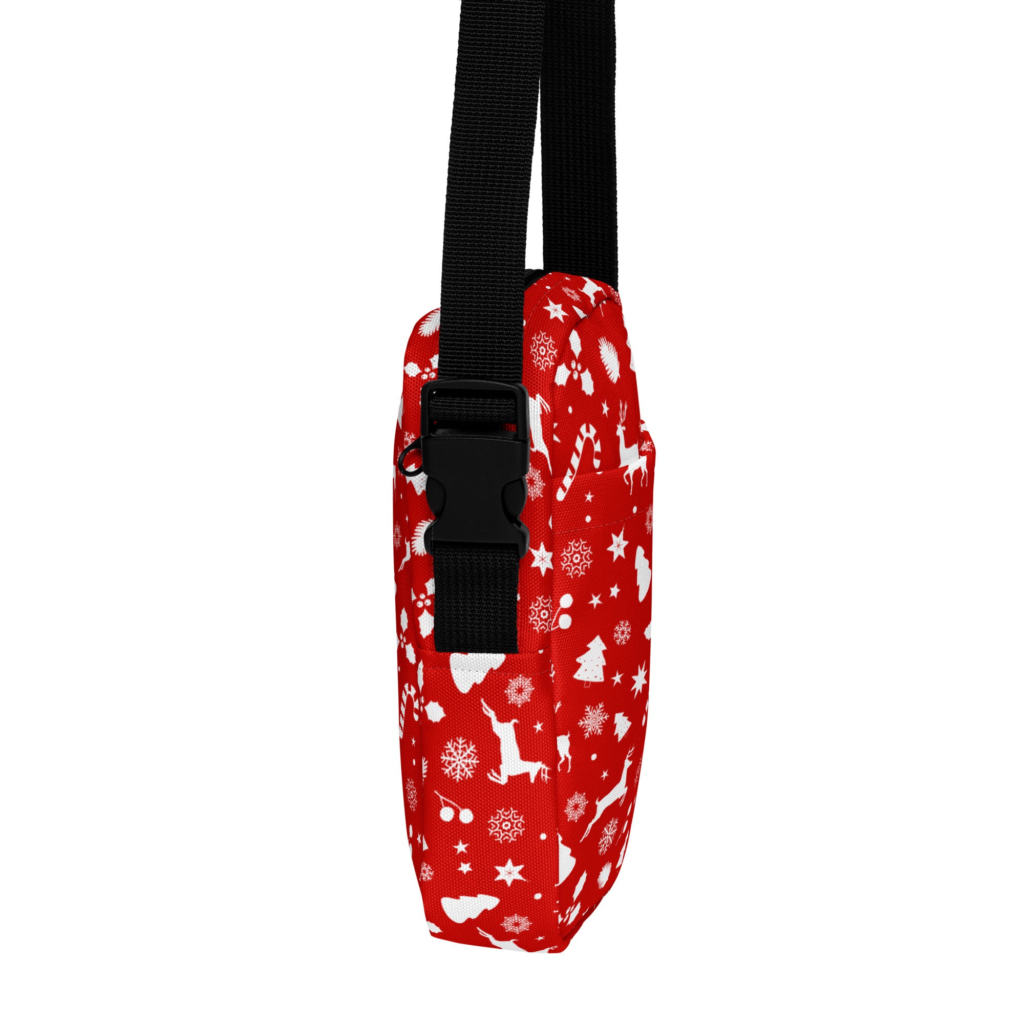 Girls red Christmas crossbody purse with white holiday pattern of reindeer snowflakes stars and candy canes