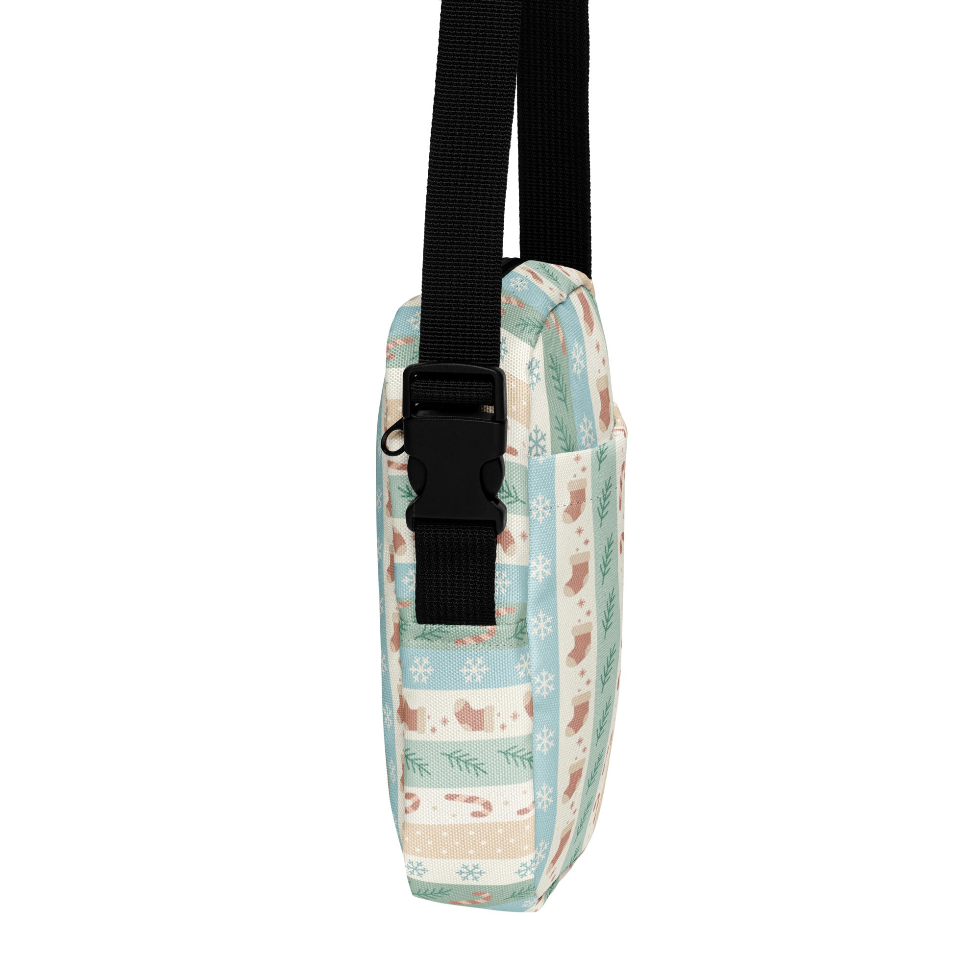 Pastel Christmas stripes women’s crossbody purse in light blue and cream with festive patterns and black adjustable strap