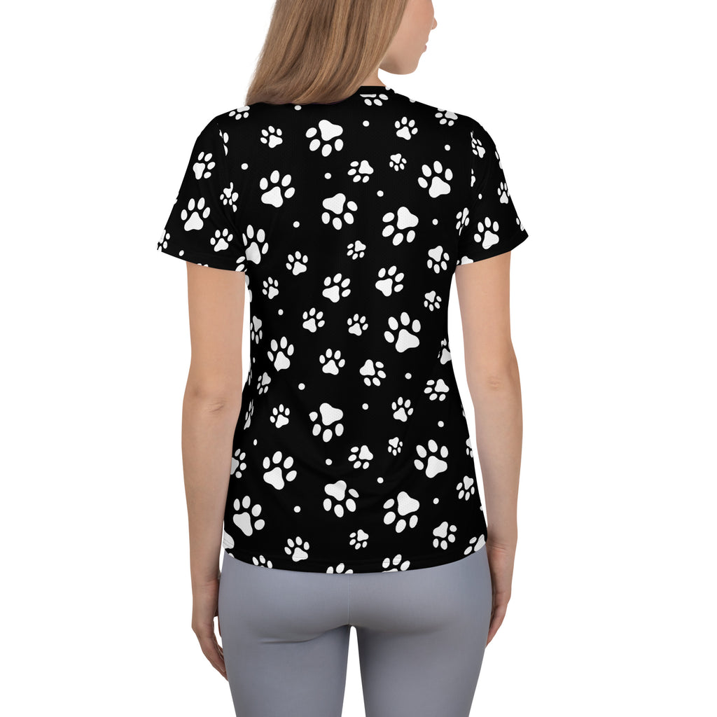 Black women’s paw print performance athletic t-shirt with white prints, lightweight moisture wicking fabric, upf 50 plus protection