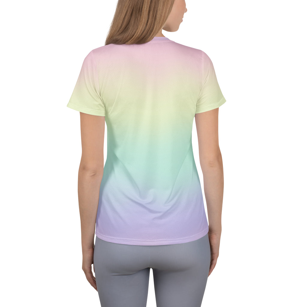 Women’s pastel rainbow performance t-shirt with a soft pink to mint green and lavender gradient, lightweight and moisture wicking