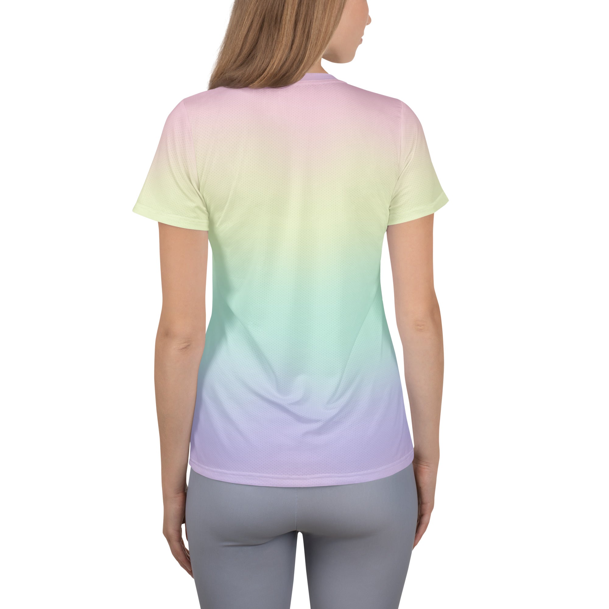 Women’s pastel rainbow performance t-shirt with a soft pink to mint green and lavender gradient, lightweight and moisture wicking