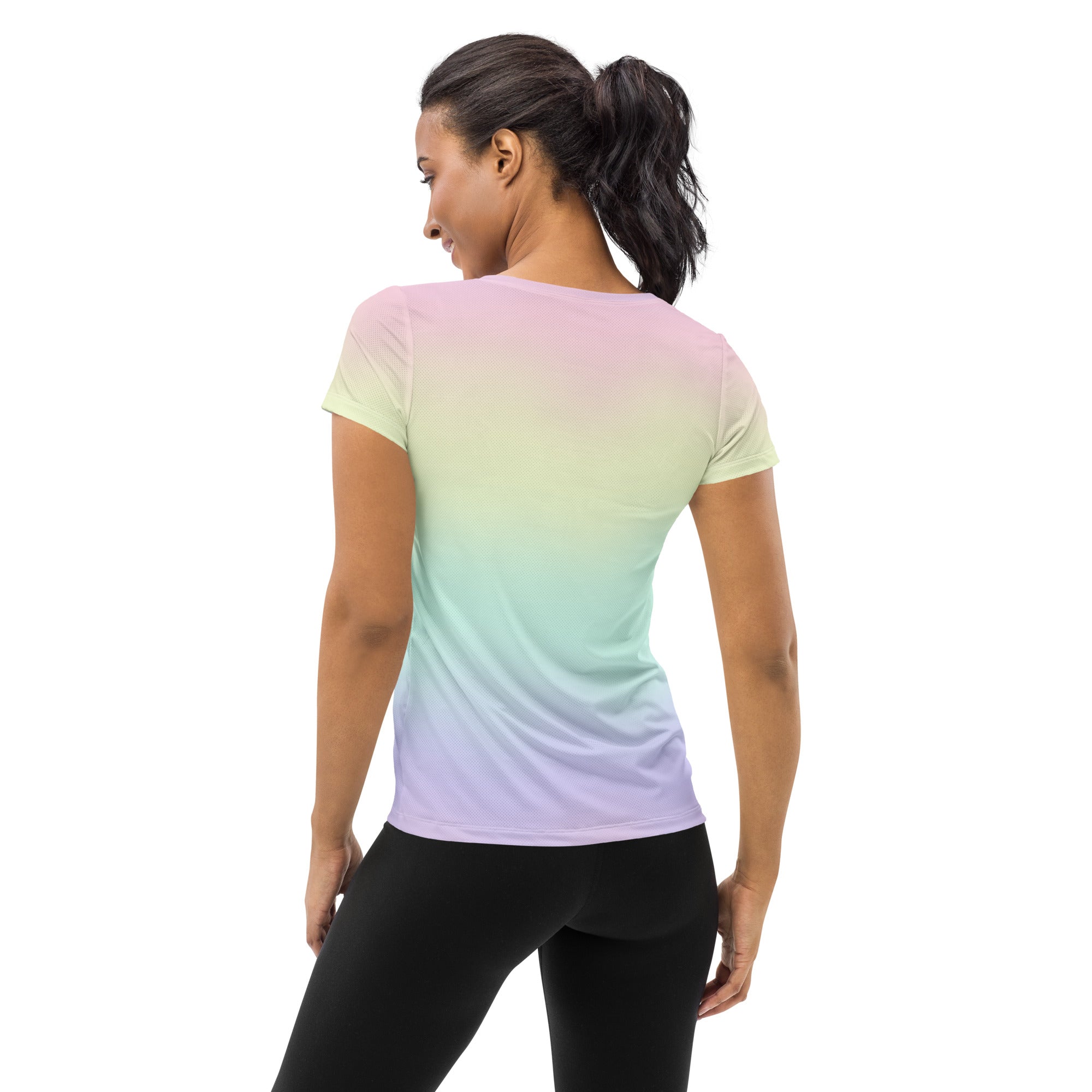 Women’s pastel rainbow performance athletic t-shirt with a pink to green to lavender gradient and moisture wicking fabric