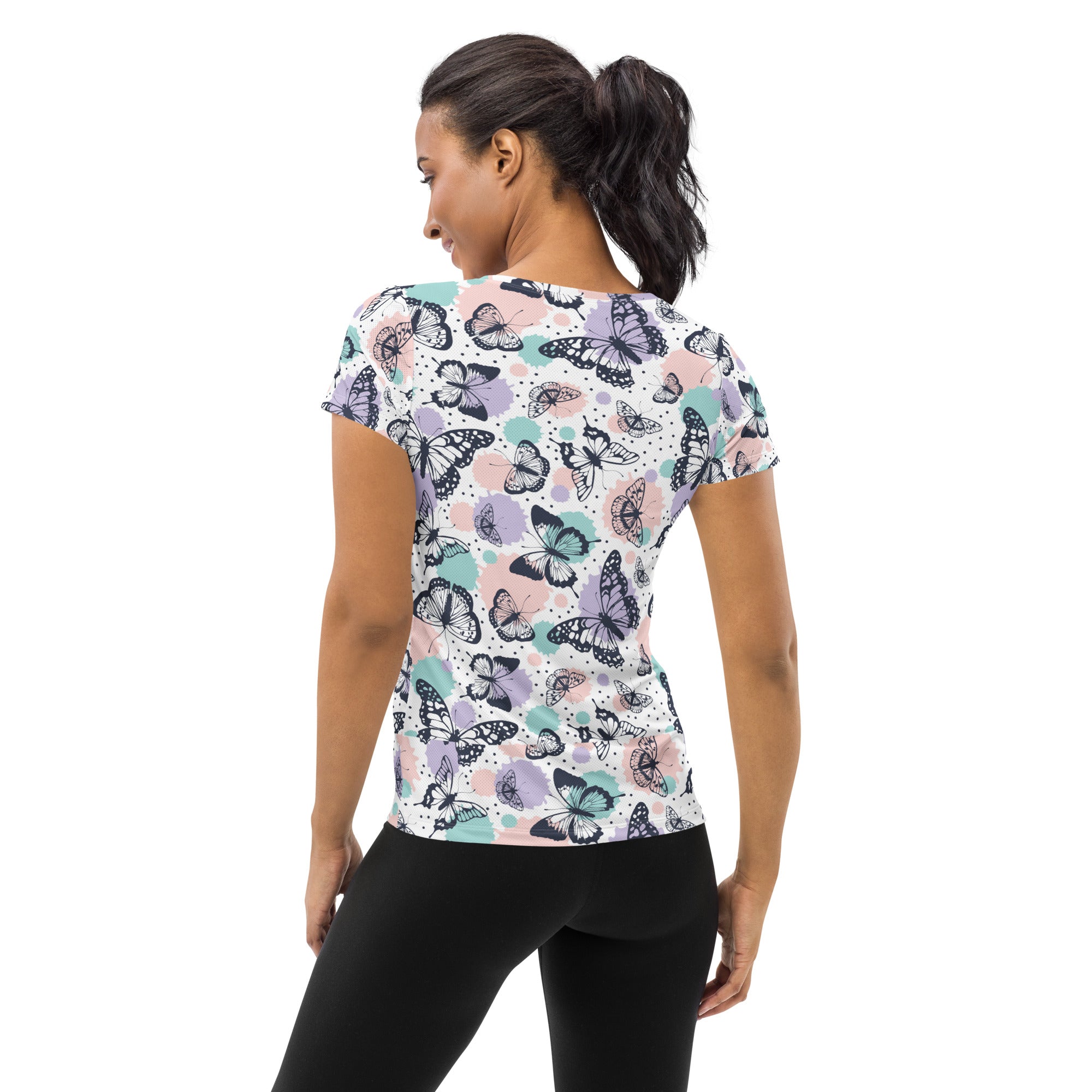 Women’s short-sleeved butterfly print performance athletic t-shirt in black purple teal on white with moisture wicking fabric