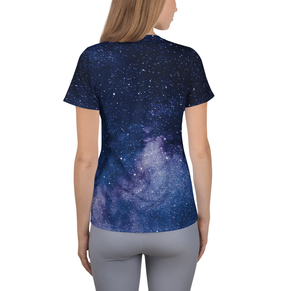 Navy blue women’s short-sleeved galaxy print performance t-shirt with moisture wicking fabric and UPF 50 plus protection