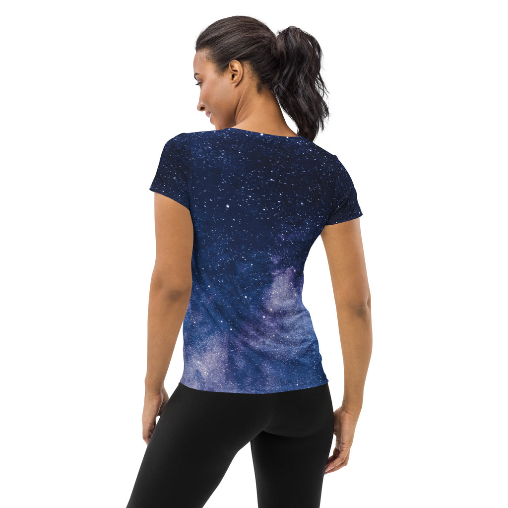 Navy blue short-sleeved women’s galaxy performance t-shirt with purple nebula print and moisture wicking fabric