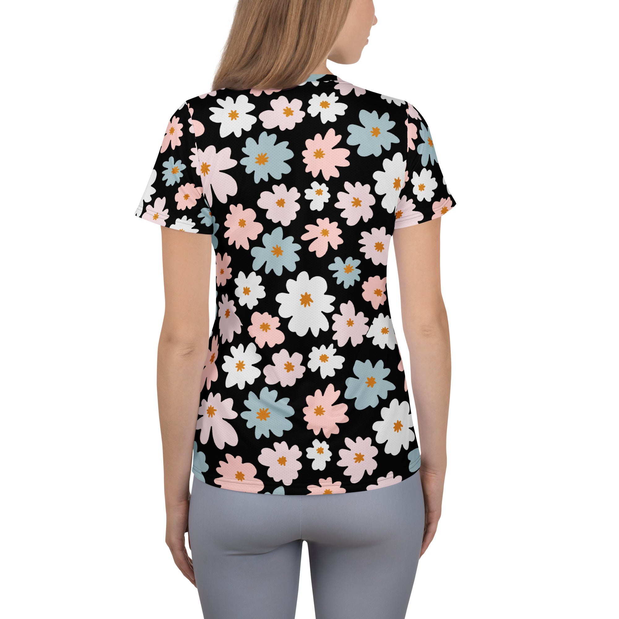 Women’s retro floral performance athletic t-shirt in black with pastel floral pattern, lightweight moisture wicking with UPF 50+