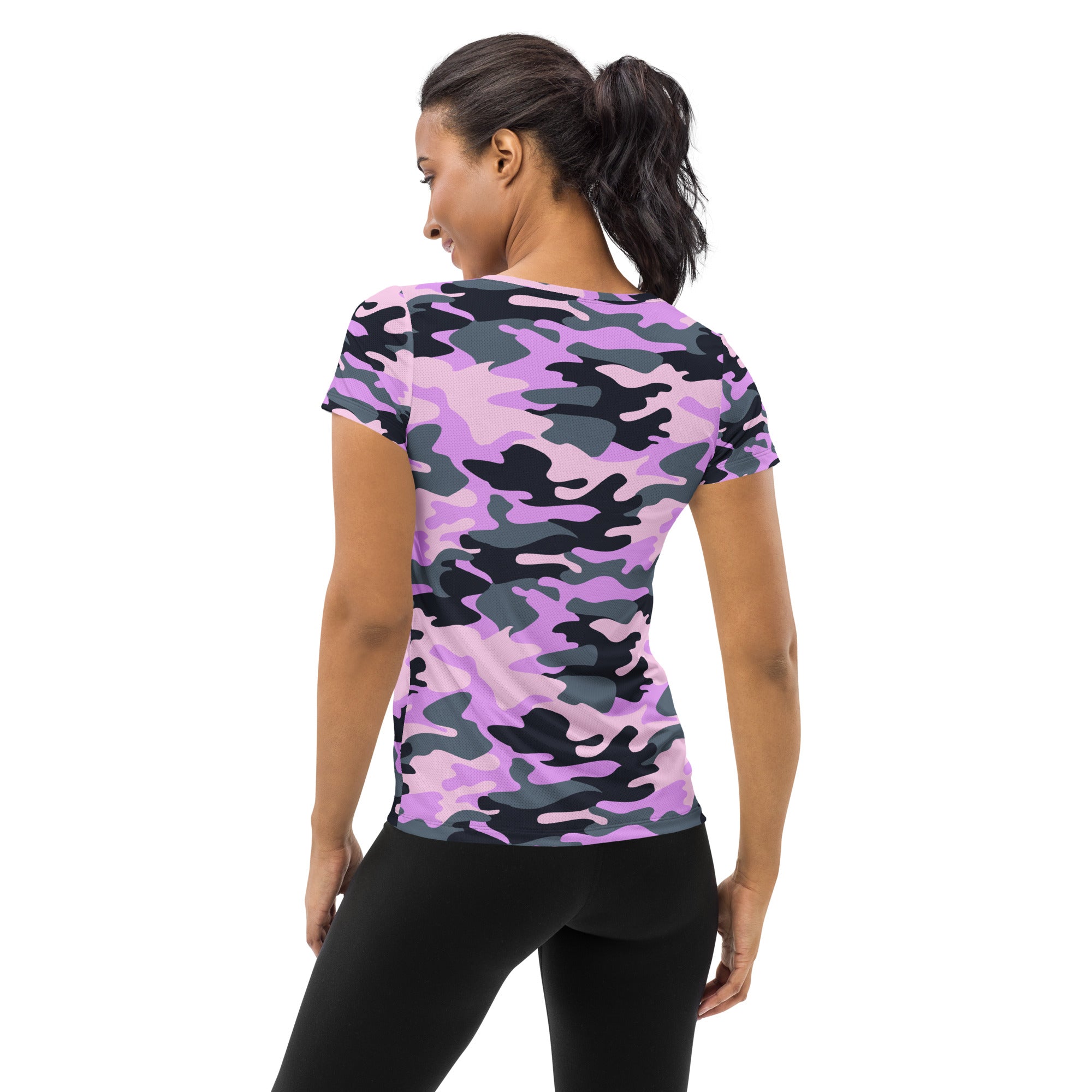 Women’s short-sleeved performance athletic t-shirt in vibrant purple and black camouflage with moisture wicking fabric
