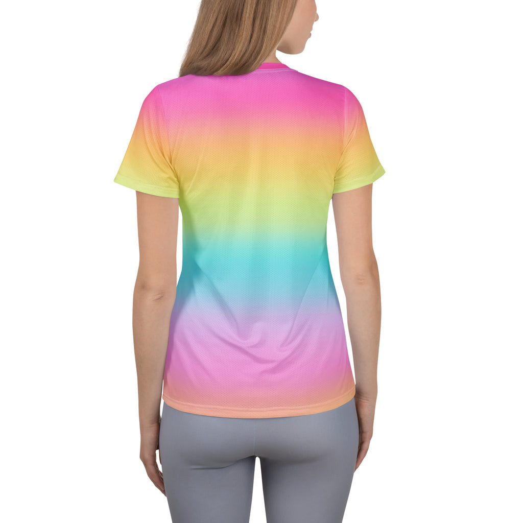 Women’s bright rainbow performance athletic t-shirt with vibrant gradient colors, lightweight moisture wicking fabric, and upf 50+ protection