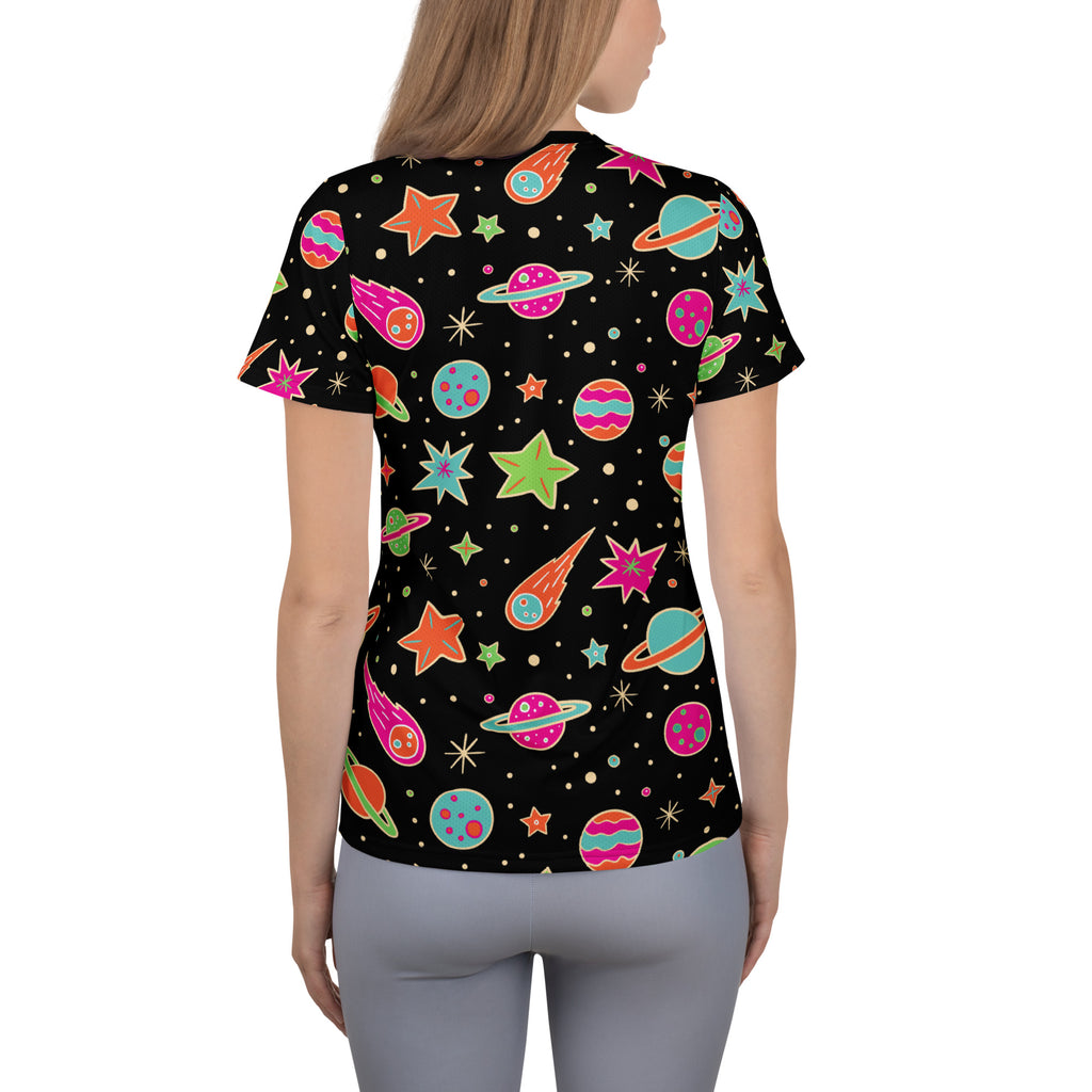 Women’s black short-sleeved retro galaxy performance t-shirt with colorful space pattern and UPF 50+ moisture wicking fabric