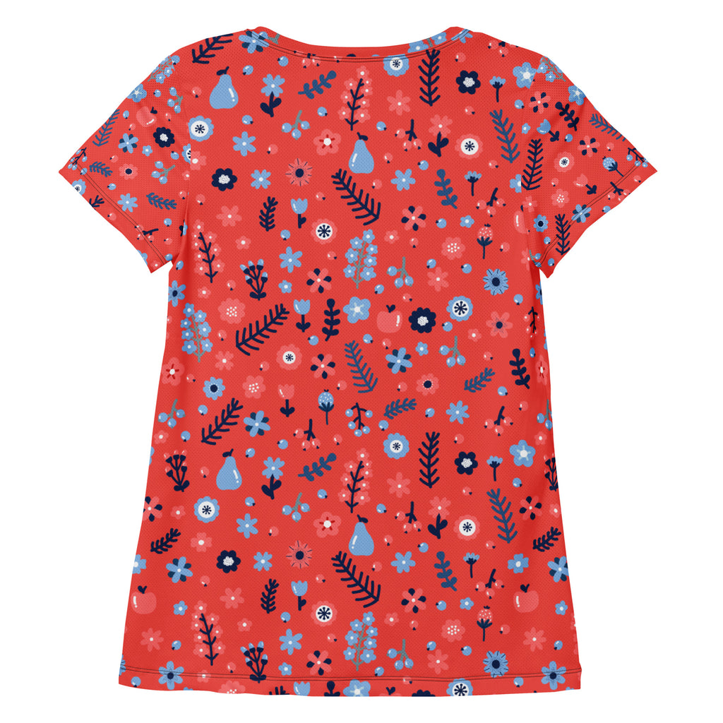 Women’s coral short-sleeved floral performance athletic t-shirt with moisture wicking fabric and UPF 50 plus protection