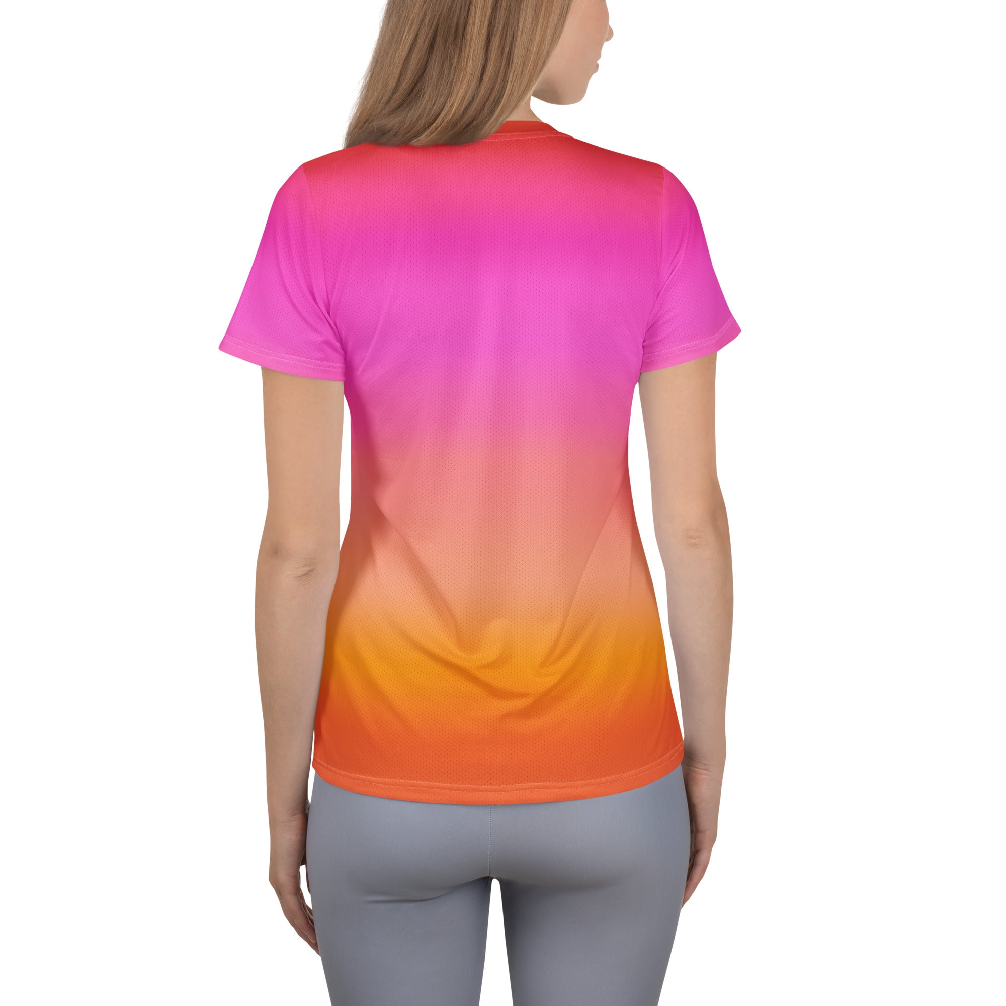Women’s sunset ombre performance athletic t-shirt in bright pink to orange gradient made from soft moisture-wicking cotton