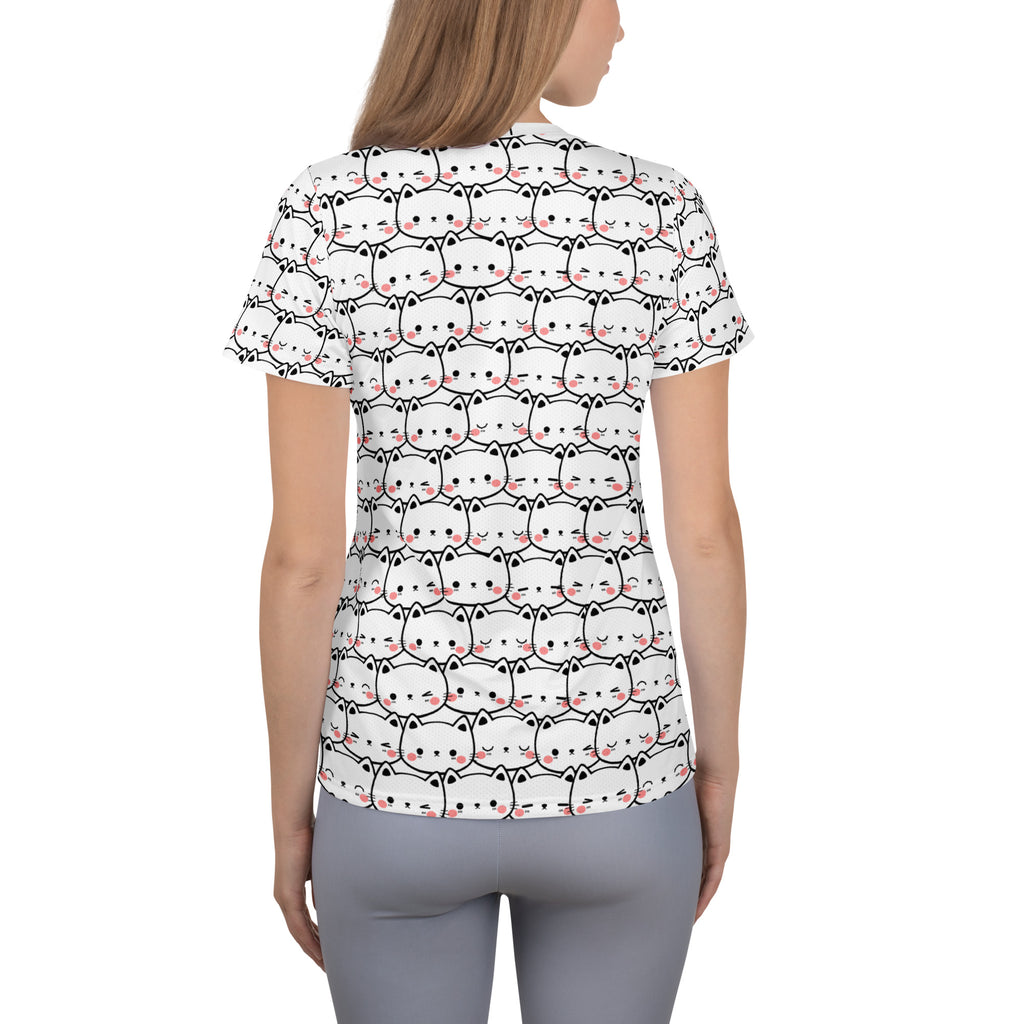 White short-sleeved women’s athletic t-shirt with cute black outline cat print and pink blush marks, moisture wicking with UPF 50+