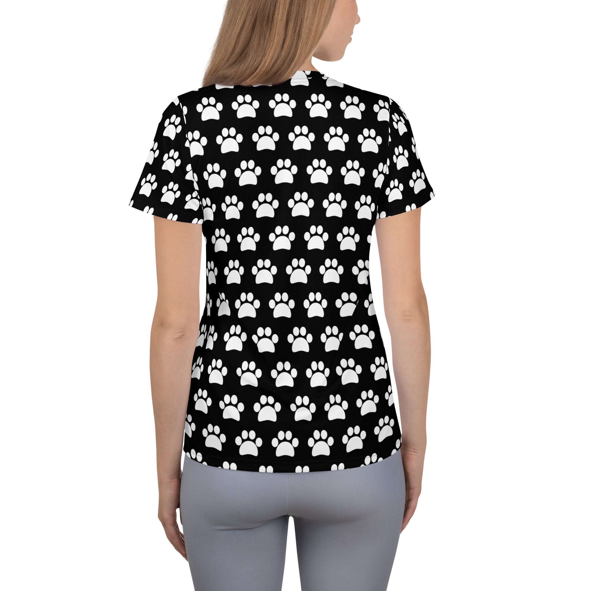 Women’s black short-sleeved performance athletic t-shirt with white paw print pattern lightweight moisture wicking