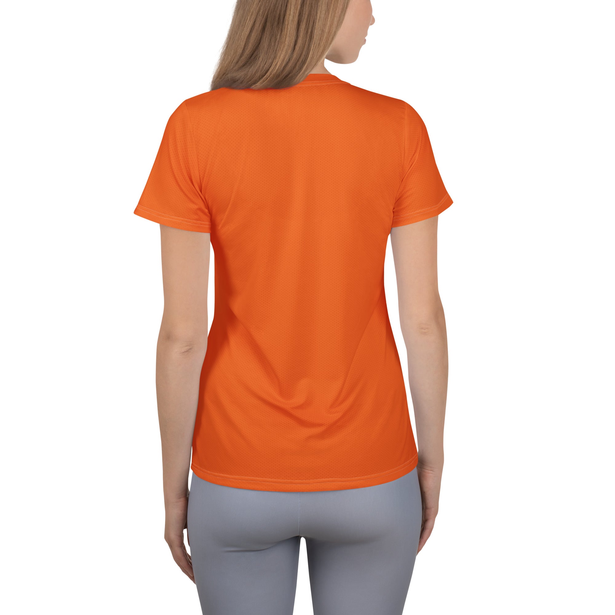 A vibrant orange short-sleeved women’s performance t-shirt with lightweight moisture-wicking fabric and UPF 50+ protection