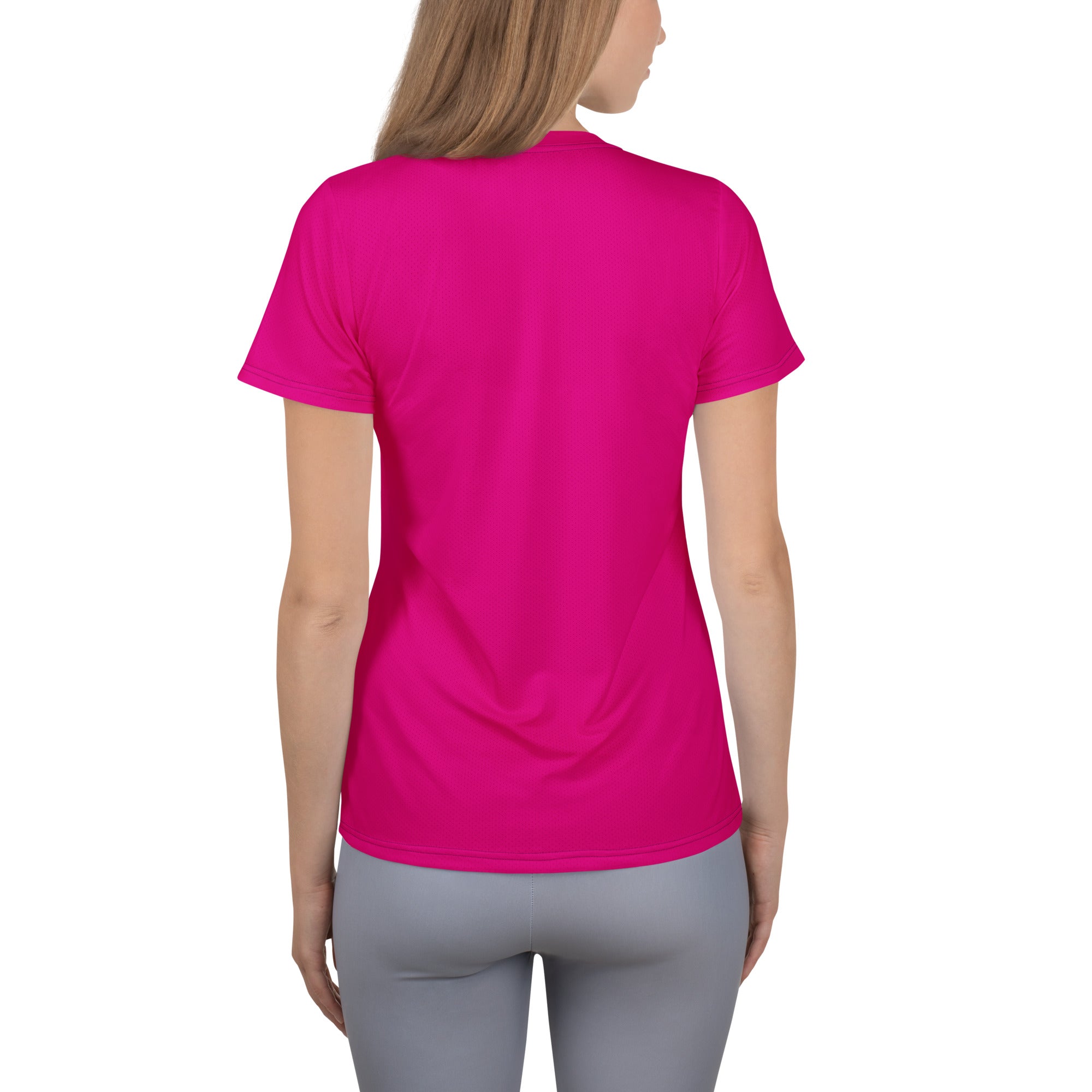 A vibrant fuchsia women’s short-sleeved athletic t-shirt with crew neck lightweight moisture wicking fabric and UPF 50+
