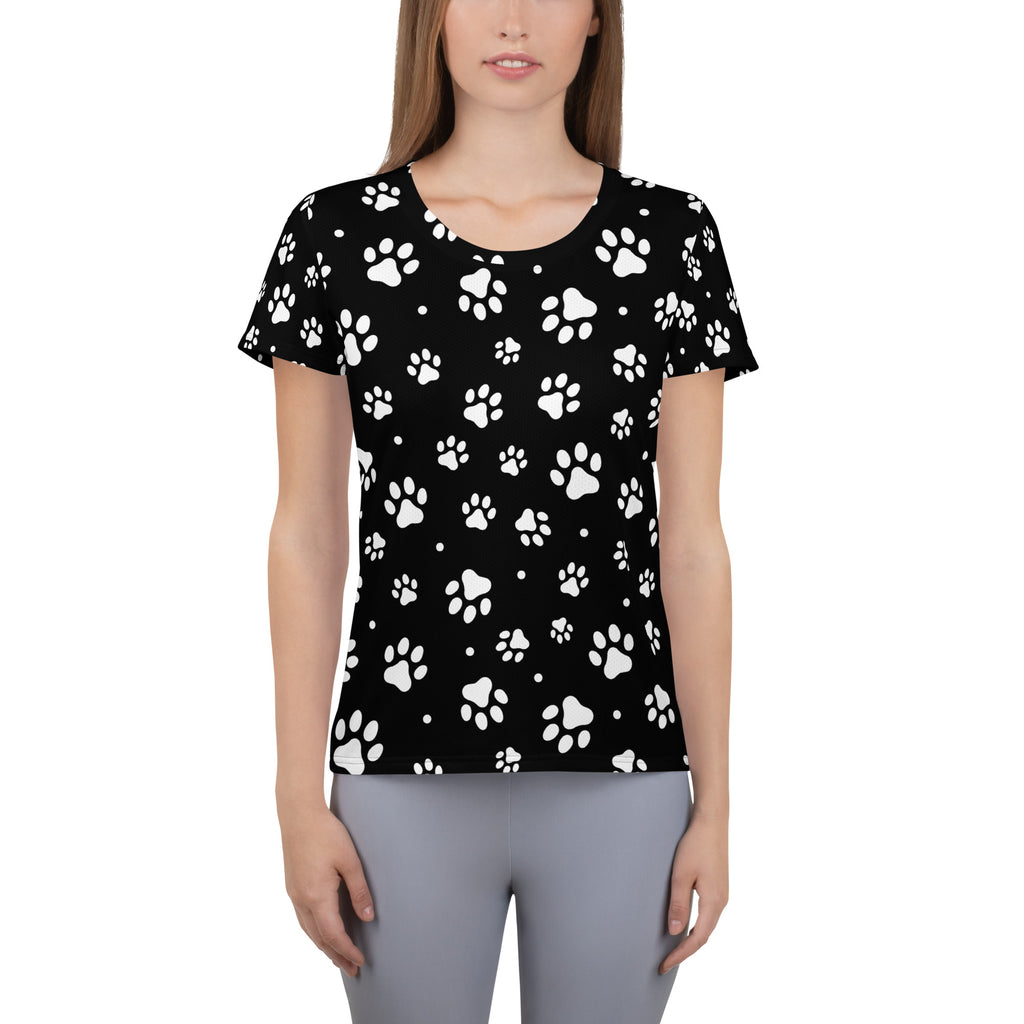 Black women’s short-sleeved paw print performance t-shirt with moisture wicking fabric and upf 50+ protection