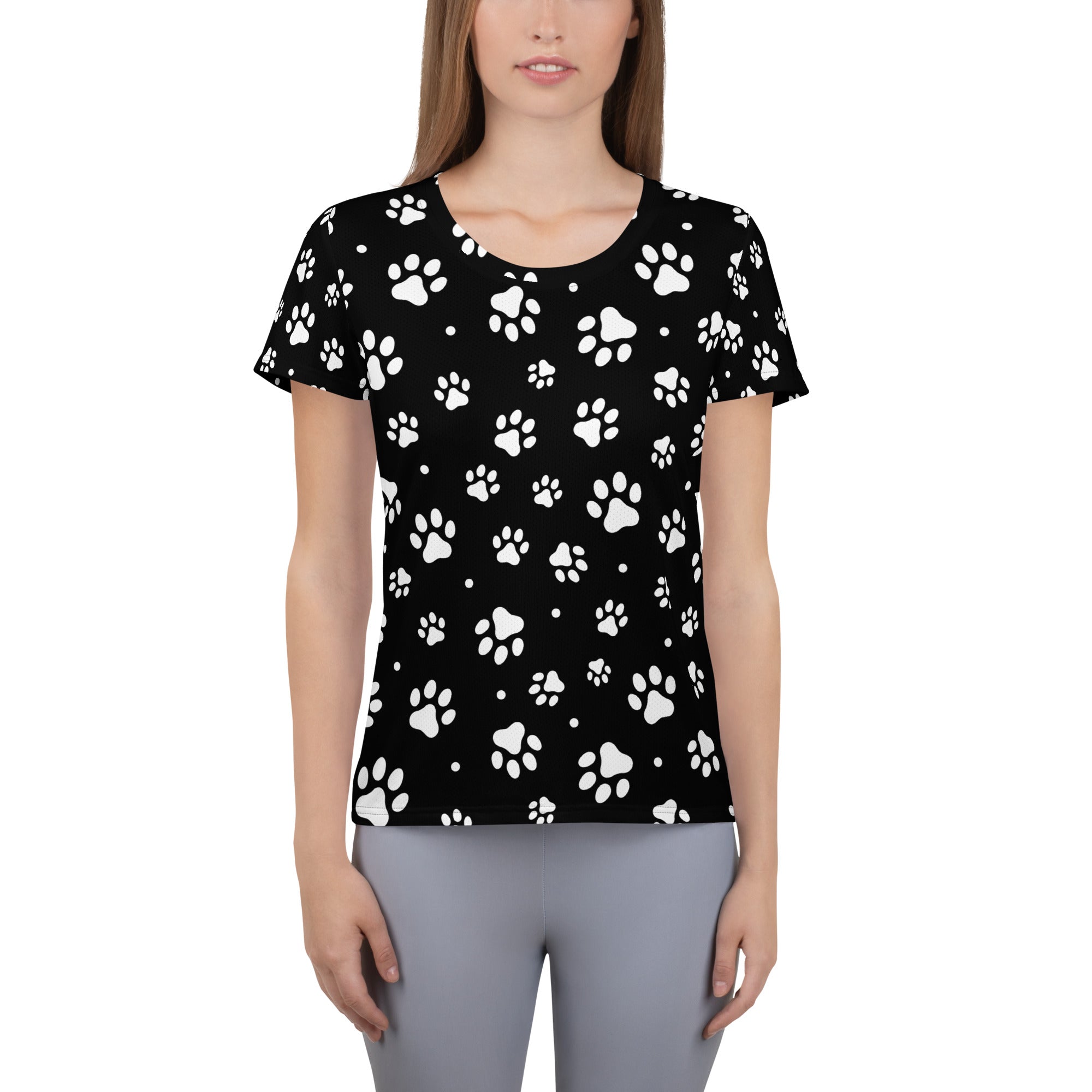 Black women’s short-sleeved paw print performance t-shirt with moisture wicking fabric and upf 50+ protection