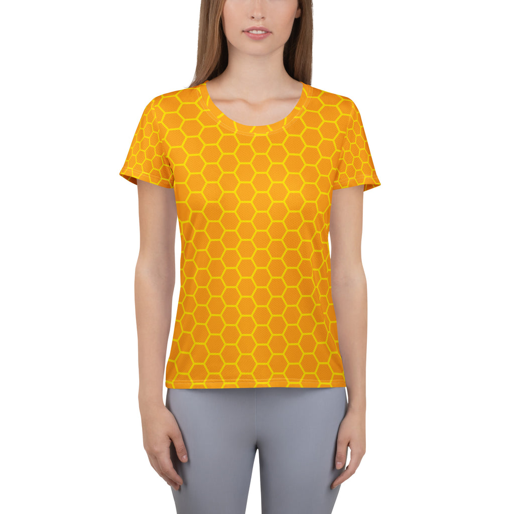 A vibrant yellow women’s honeycomb performance athletic t-shirt with moisture wicking fabric and UPF 50+ protection