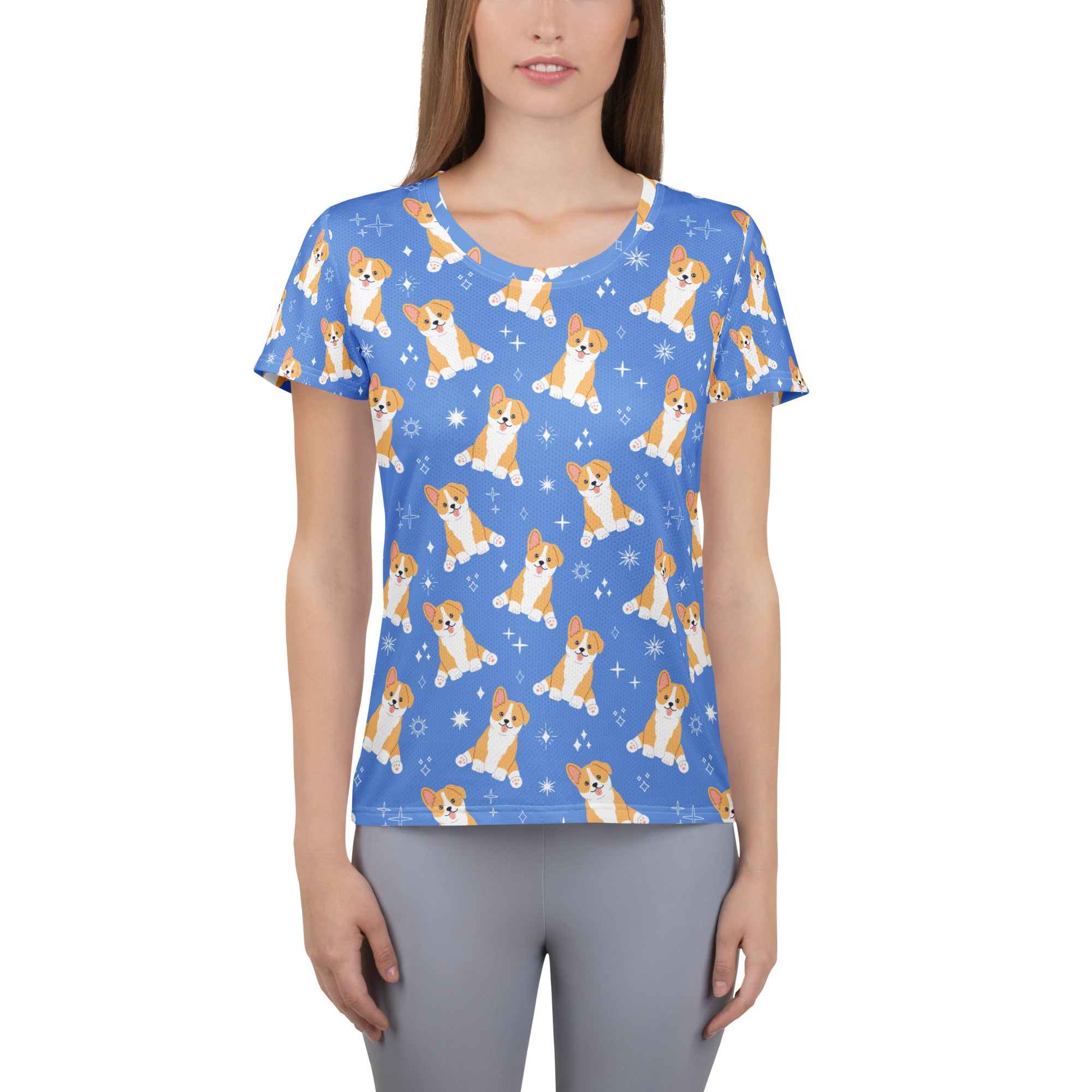 Women’s blue short-sleeved corgi dog performance athletic t-shirt with playful pattern and moisture-wicking fabric