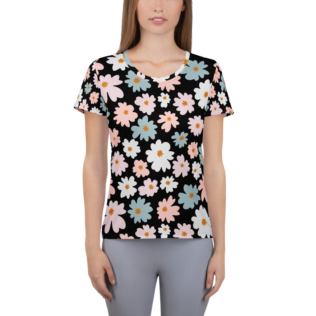 Black women’s retro floral performance t-shirt with pink white and blue daisies lightweight moisture wicking top