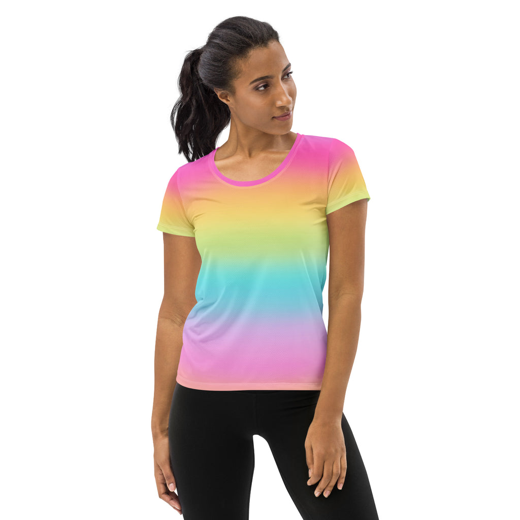 Women’s bright rainbow performance athletic t-shirt with a vibrant pink yellow blue gradient and moisture wicking fabric