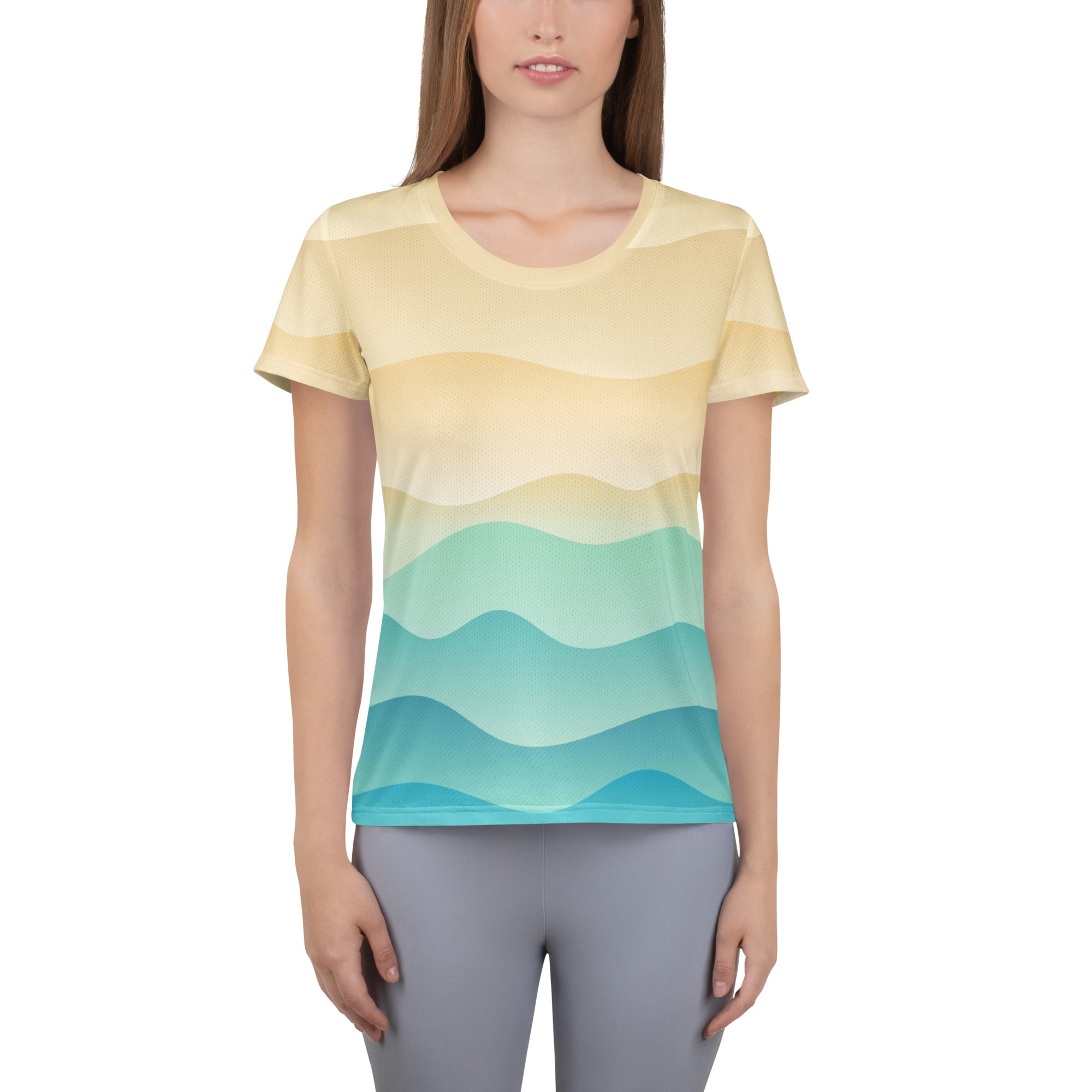 Women’s short-sleeved performance athletic t-shirt with soft yellow and teal gradient wavy stripes and UPF 50+ protection