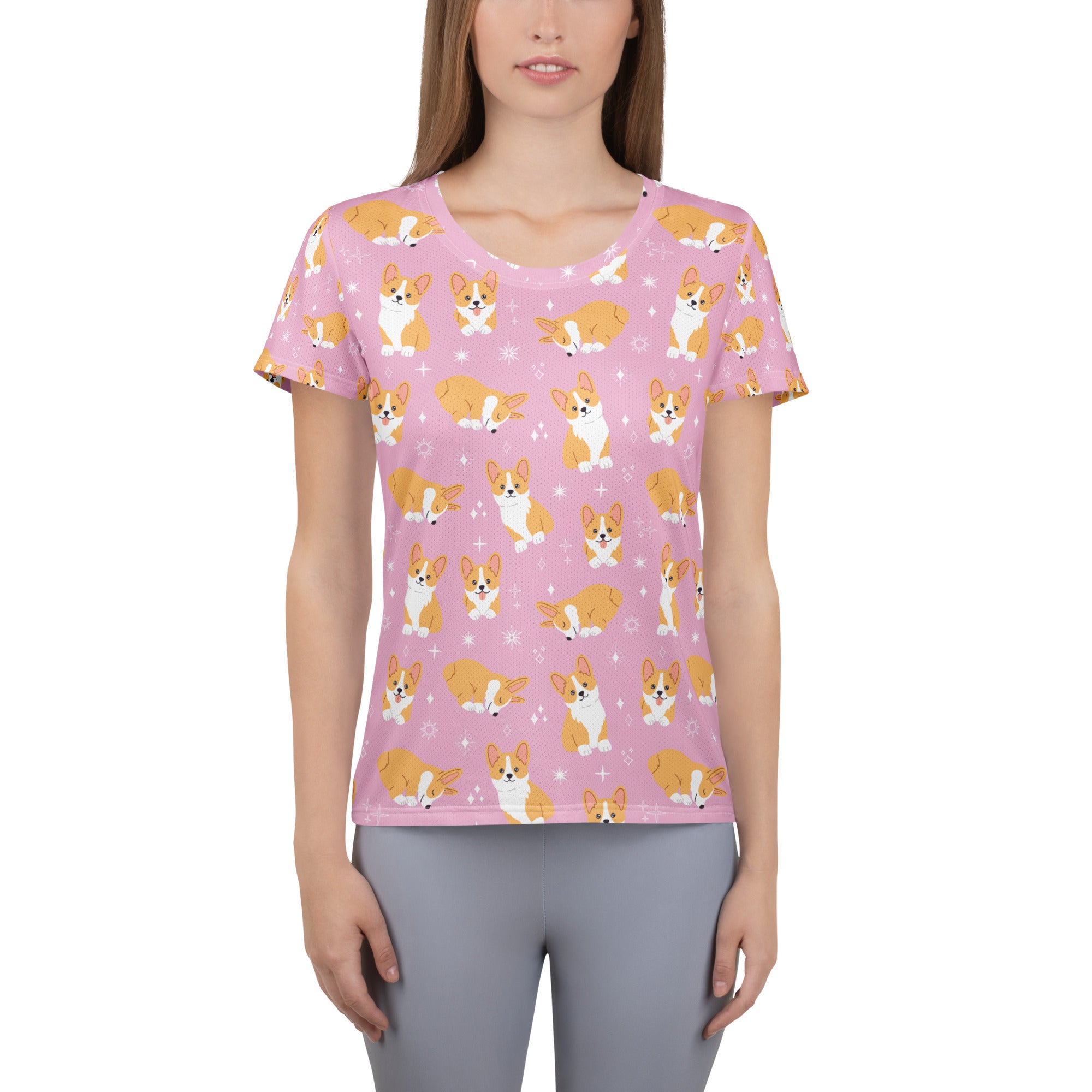 Women’s pink short-sleeved corgi dog performance athletic t-shirt with lightweight moisture wicking fabric and UPF 50+ protection