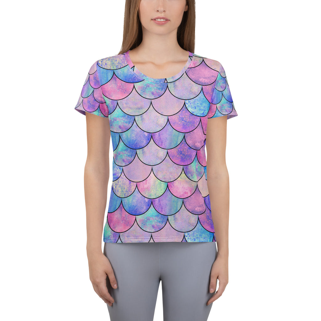 Women’s pastel mermaid performance athletic t-shirt with vibrant pink purple blue watercolor scale pattern and upf 50+