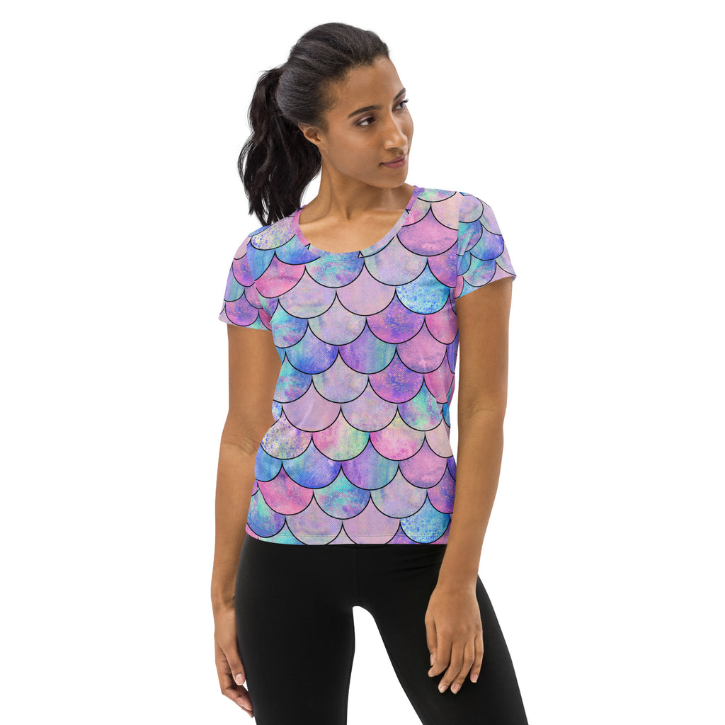 Women’s pastel mermaid performance athletic t-shirt with vibrant pink purple blue iridescent scales lightweight and moisture wicking