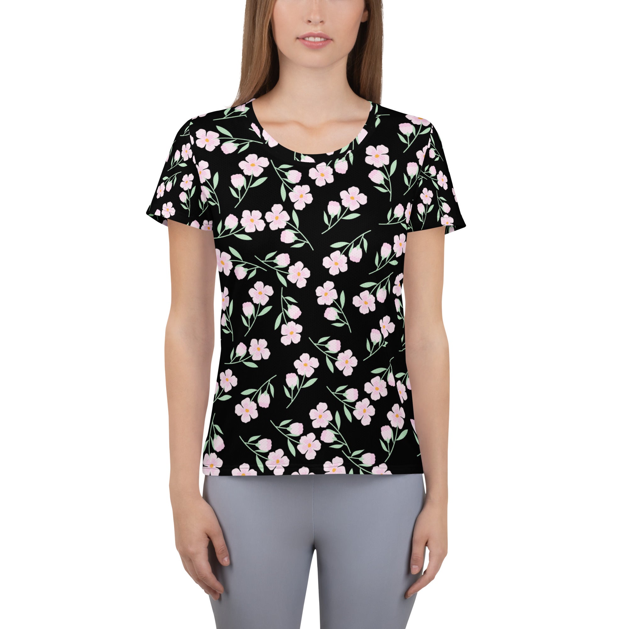 Women’s black floral performance athletic t-shirt with pink flowers green stems lightweight moisture wicking fabric
