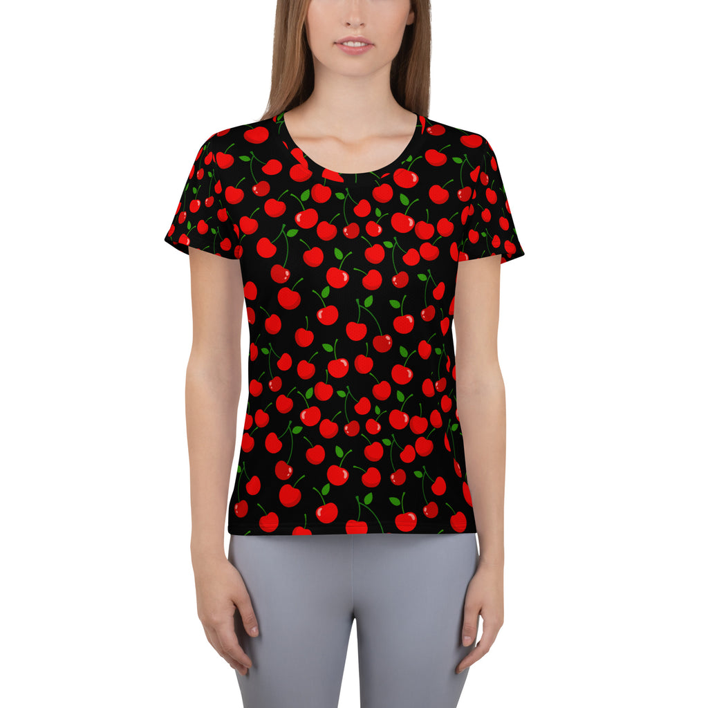 Black women’s bold cherry performance athletic t-shirt with vibrant red cherry pattern and moisture wicking fabric