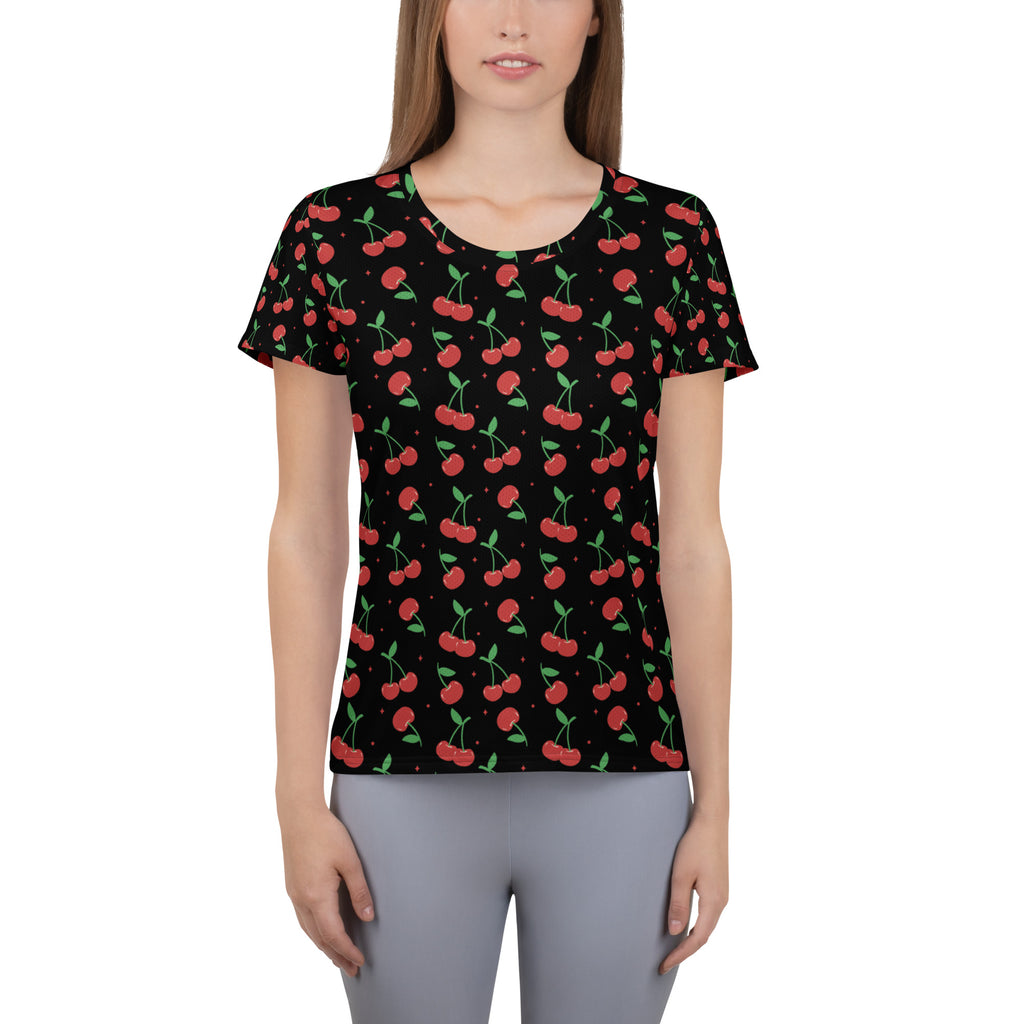 Black women’s cherry print performance athletic t-shirt featuring vibrant red cherries with green stems and moisture wicking fabric