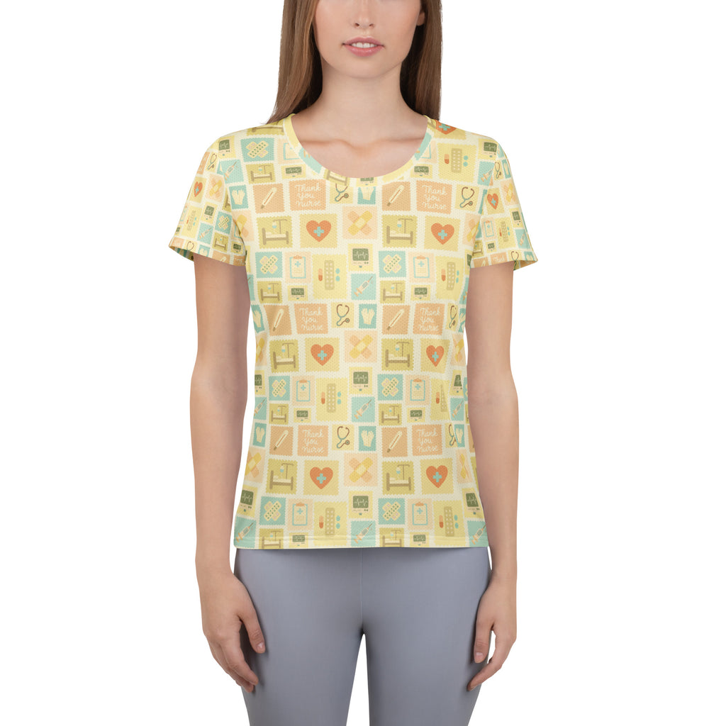 Women’s yellow nurse icon performance athletic t-shirt with pastel blue and beige medical print lightweight moisture wicking