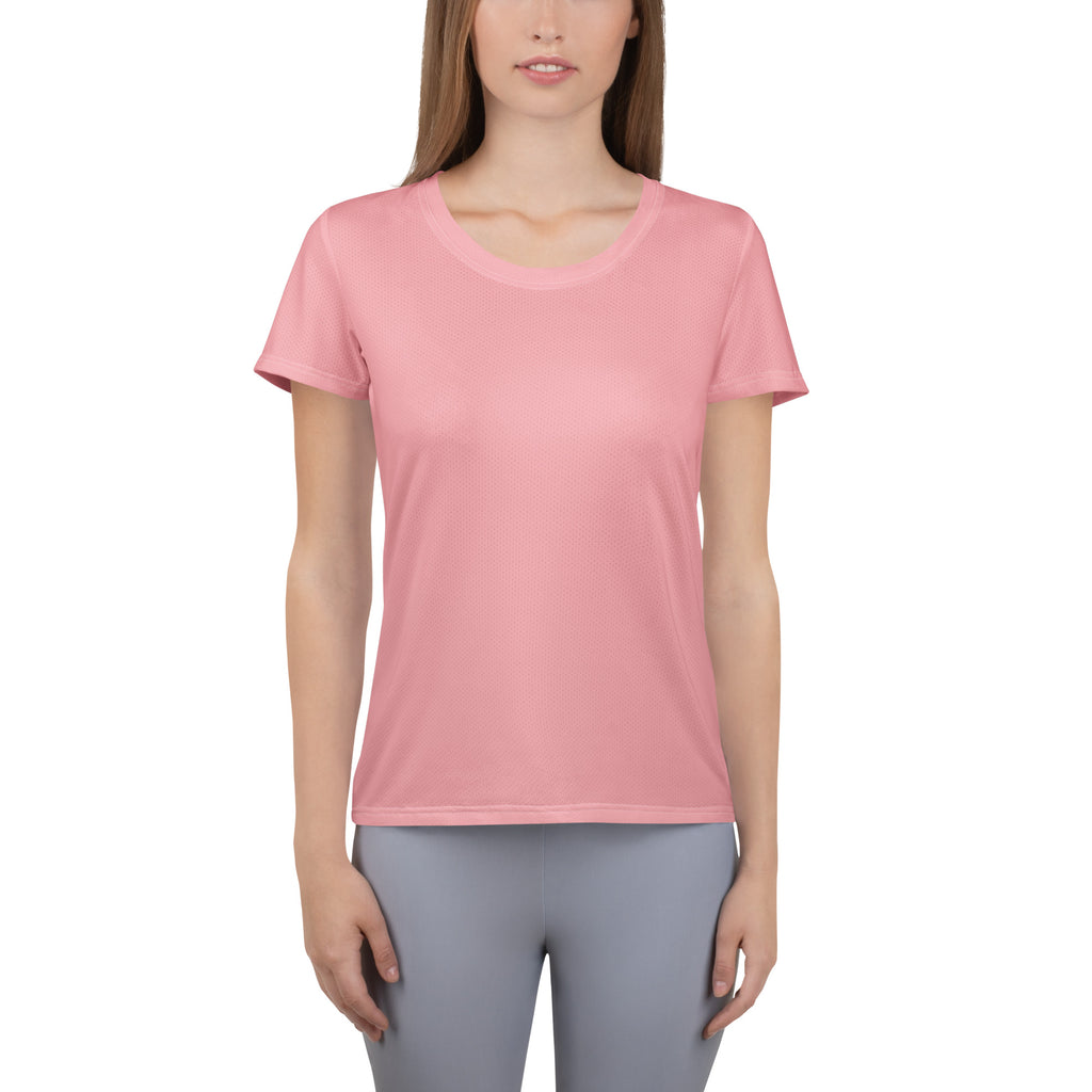 A soft pink women’s short-sleeved performance t-shirt with a rounded neckline and lightweight moisture wicking fabric