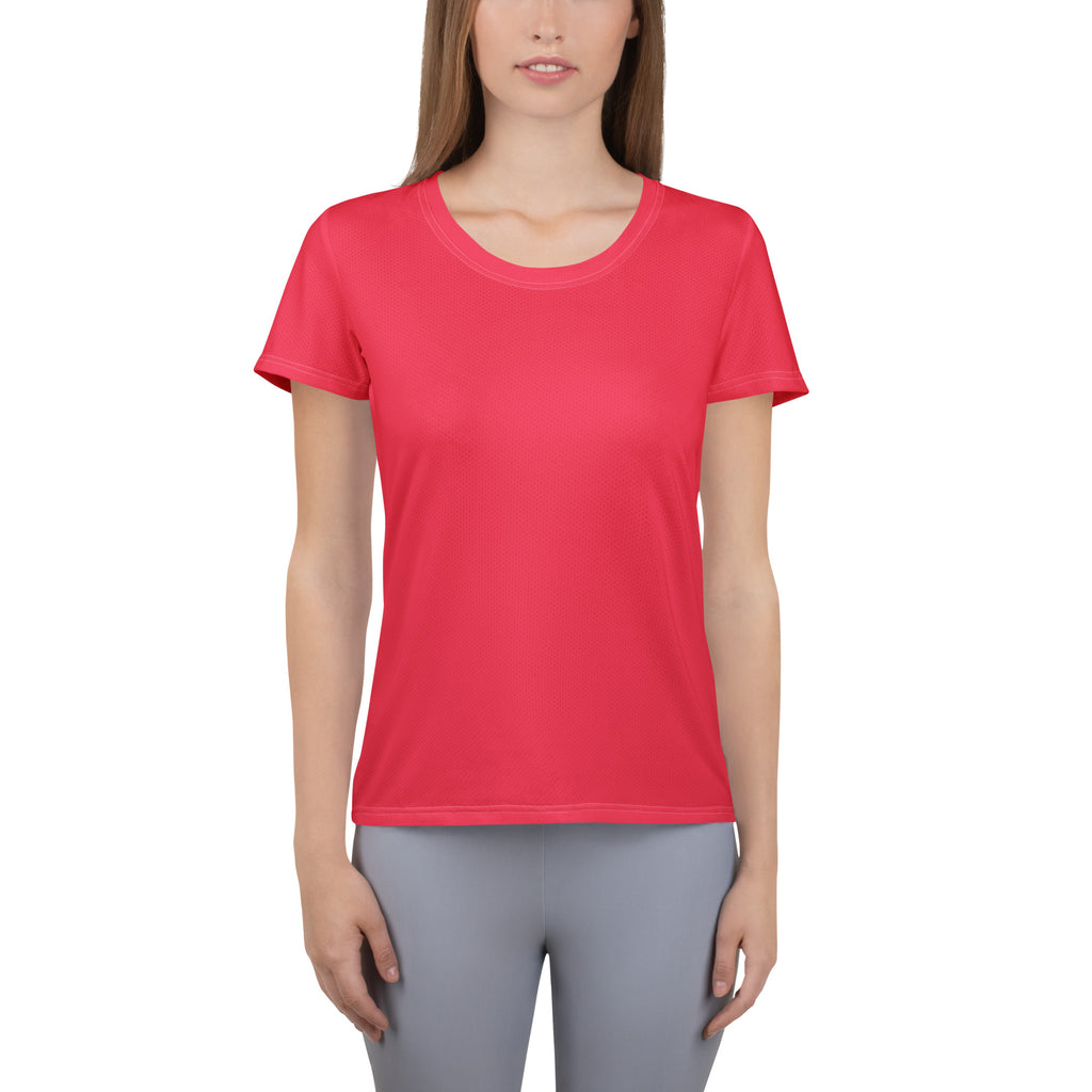 A vibrant coral-colored women’s bright pink performance t-shirt with short sleeves, round neckline, and moisture-wicking fabric