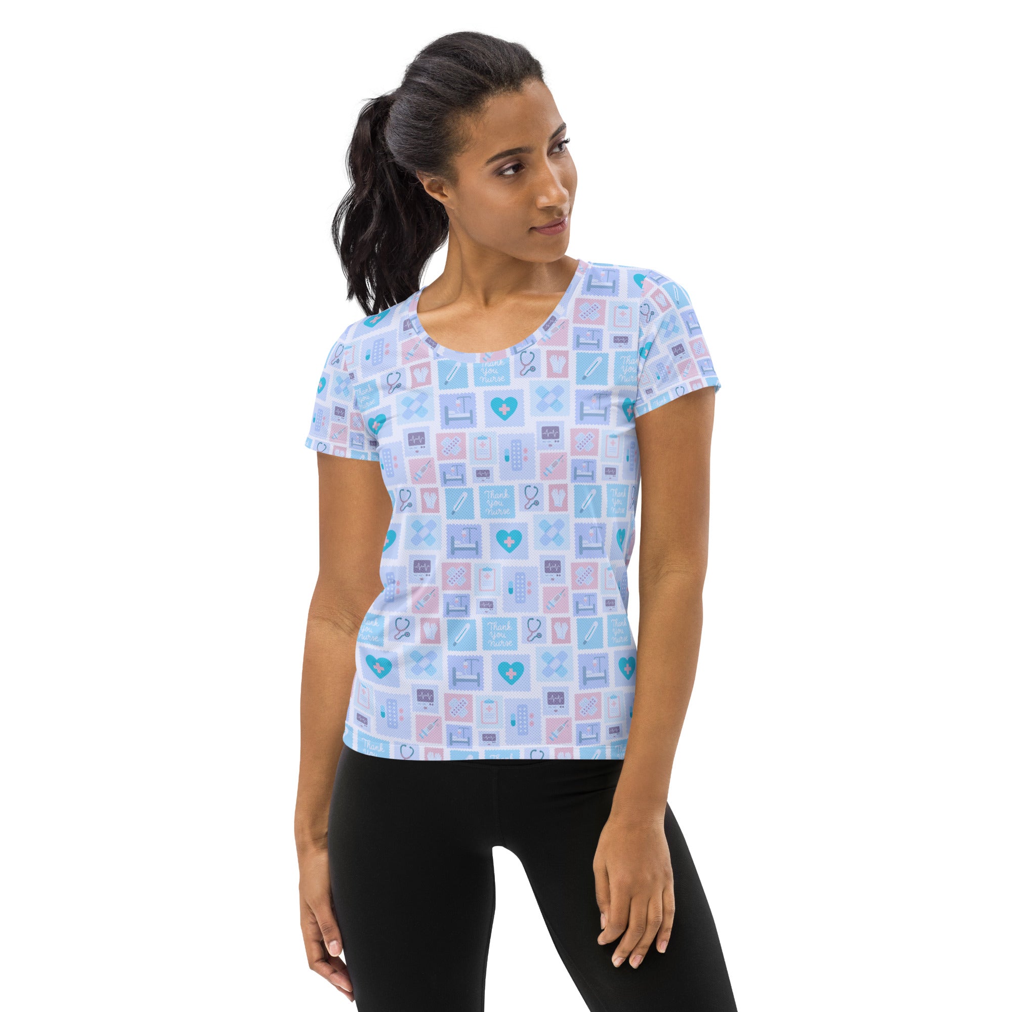 Women’s blue nurse icon performance athletic t-shirt in light blue and pink with medical icon pattern and moisture wicking fabric