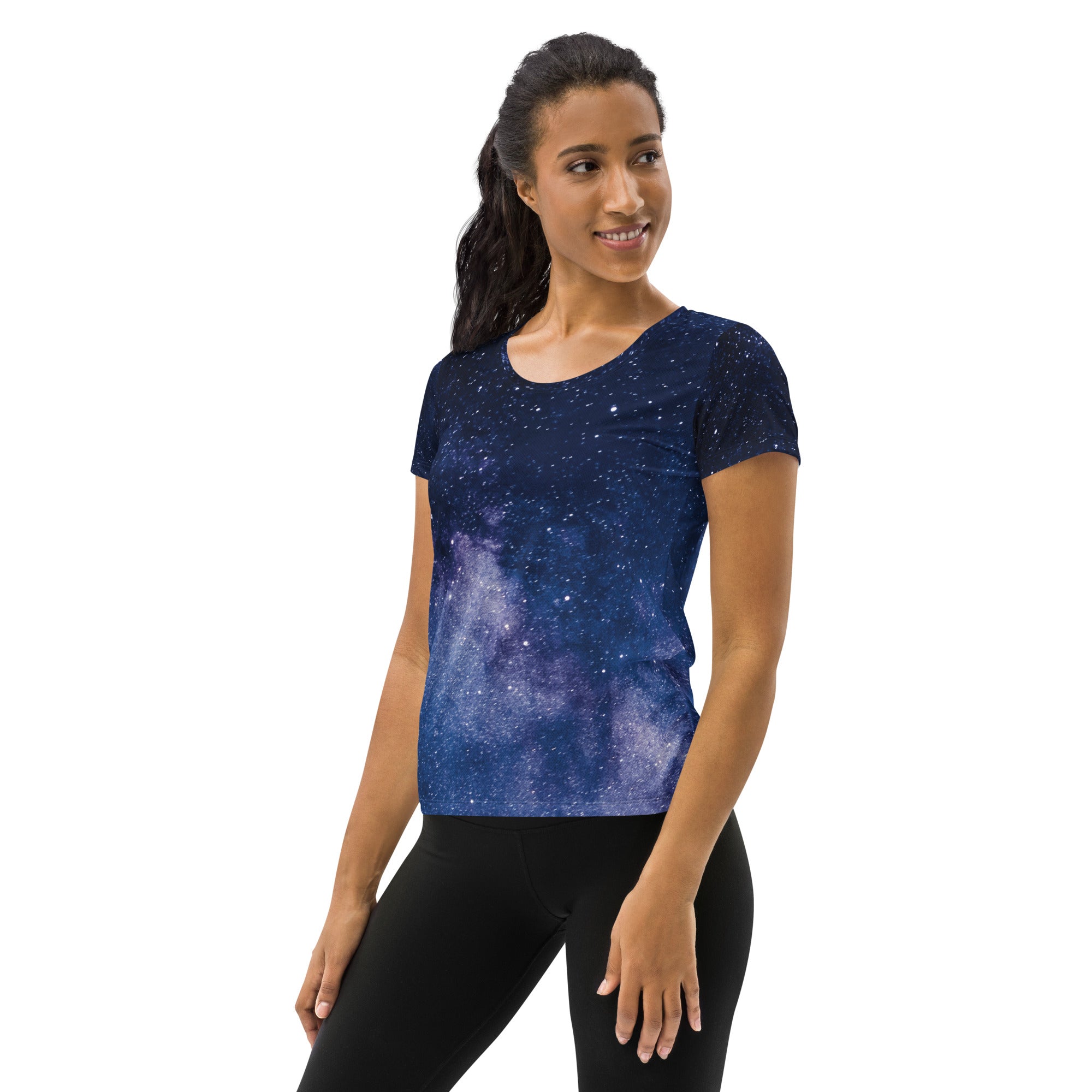 A navy blue women’s performance t-shirt with a realistic galaxy print, lightweight moisture wicking fabric, and UPF 50+ protection