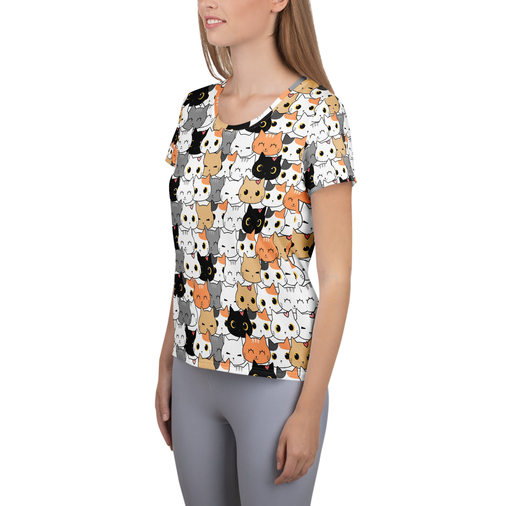 White short-sleeved women’s athletic t-shirt with colorful cartoon cat pattern lightweight moisture wicking top