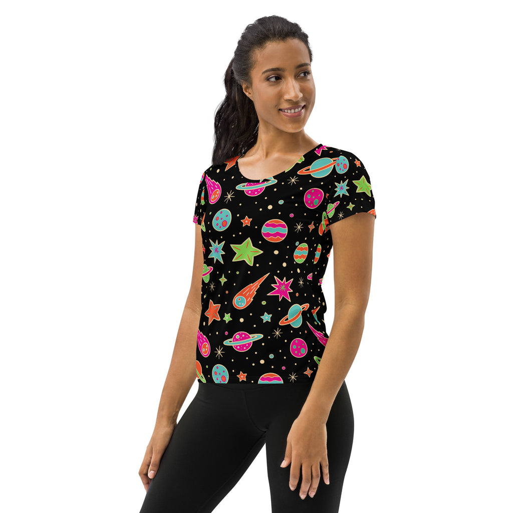 Black women’s retro galaxy performance t-shirt with vibrant space print, lightweight moisture wicking fabric, UPF 50+