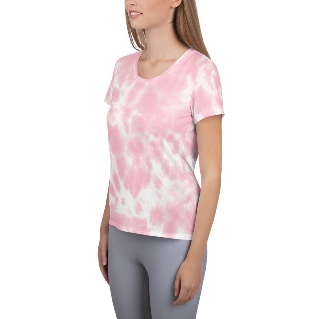 A soft pink and white tie dye short-sleeved performance athletic t-shirt with moisture wicking fabric and UPF 50+