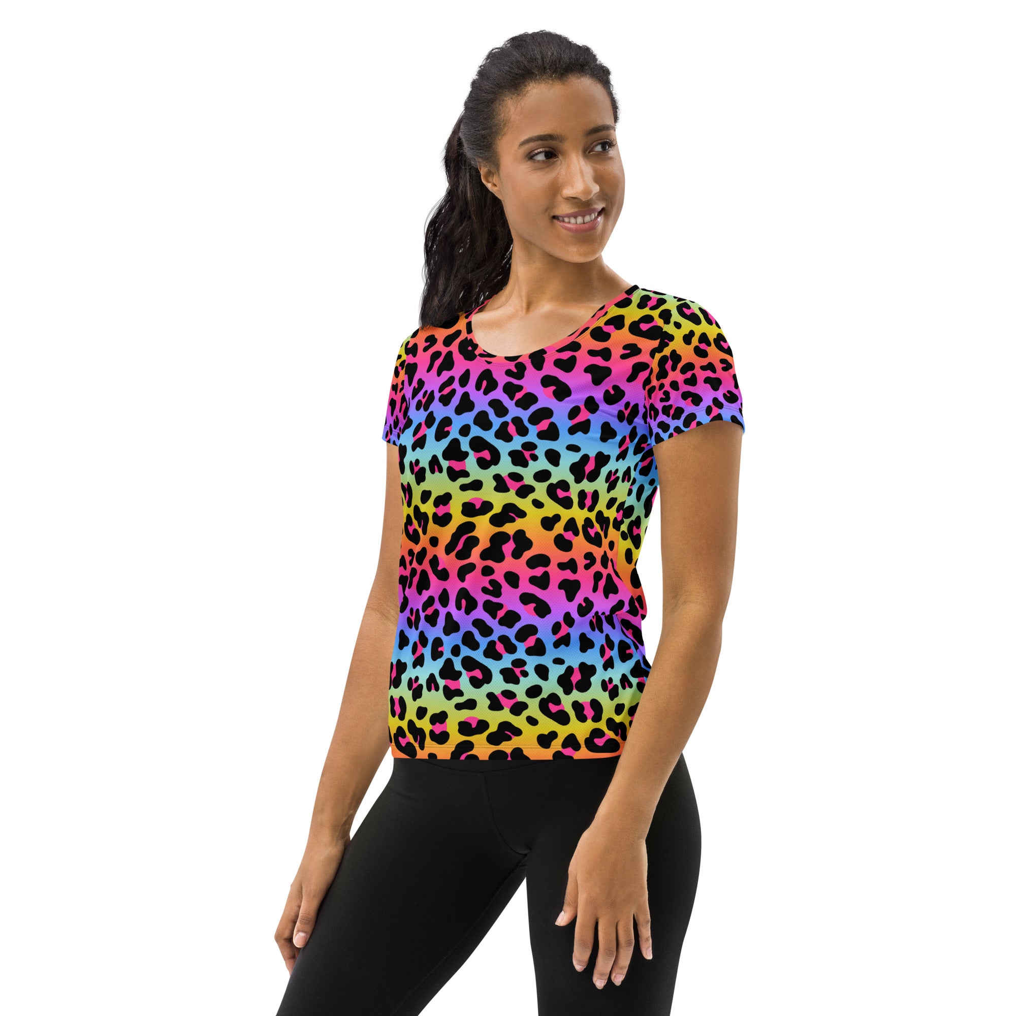 A vibrant rainbow-colored leopard print women’s short-sleeved performance athletic t-shirt with round neckline and UPF 50+