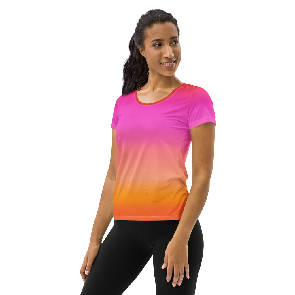 Women’s sunset ombre performance athletic t-shirt in pink to orange gradient made of smooth moisture-wicking fabric