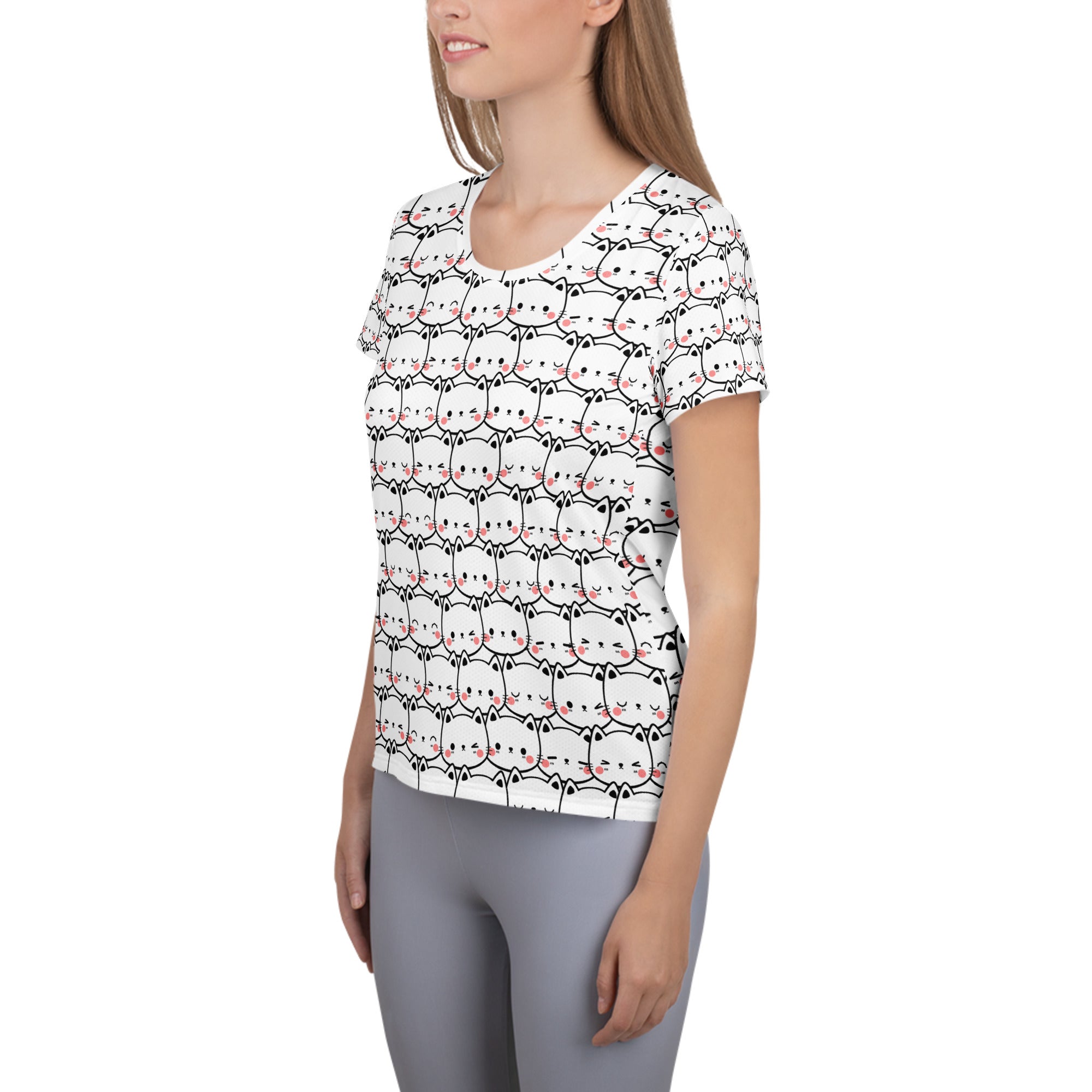 White women’s short-sleeved performance t-shirt with cute cartoon cat print, lightweight moisture wicking with UPF 50+